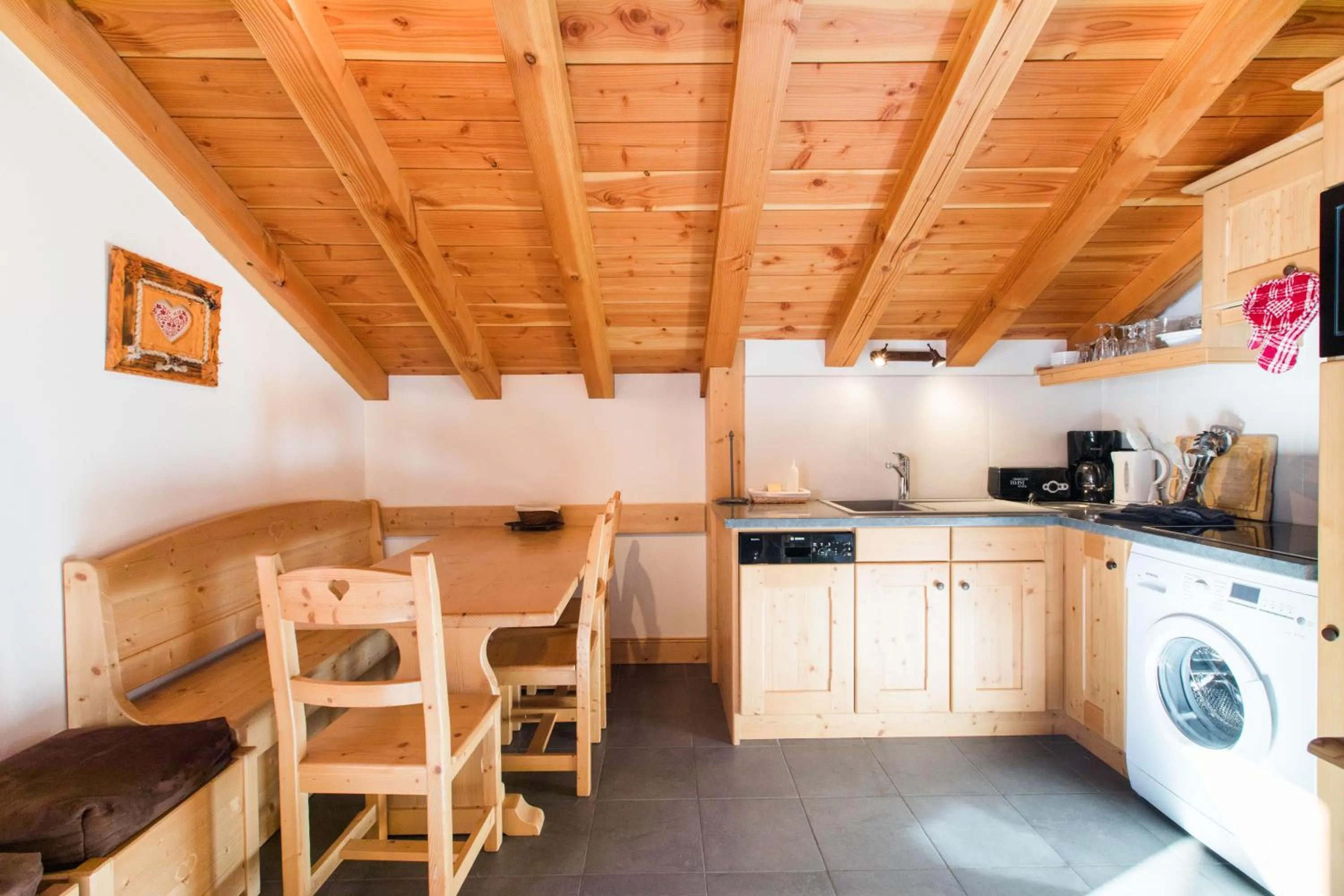 Kitchen or kitchenette in Les Chalets de La Griyotire