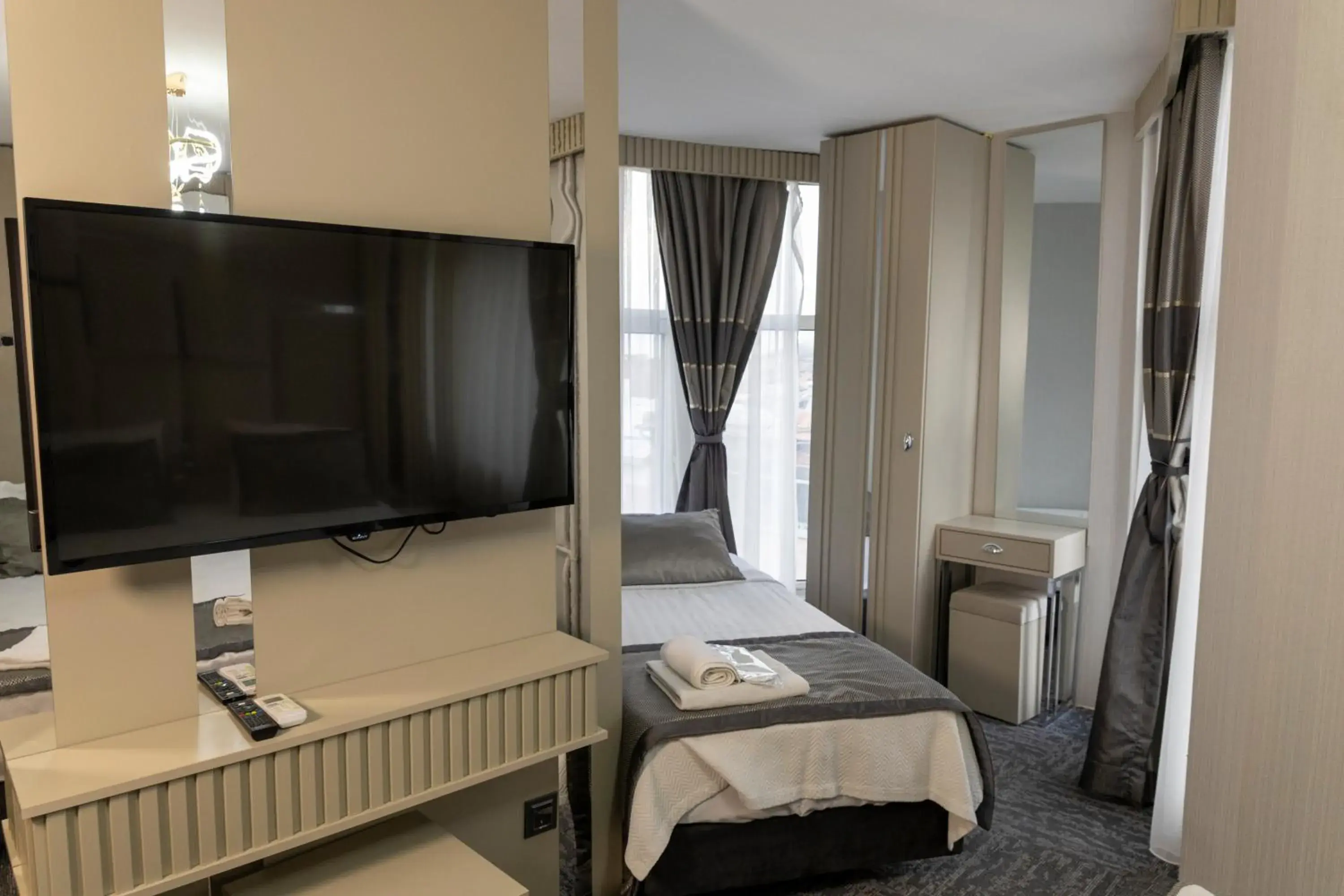 Photo of the whole room, Bed in Grand Heykel Hotel Photo of the whole room, Bed in Grand Heykel Hotel