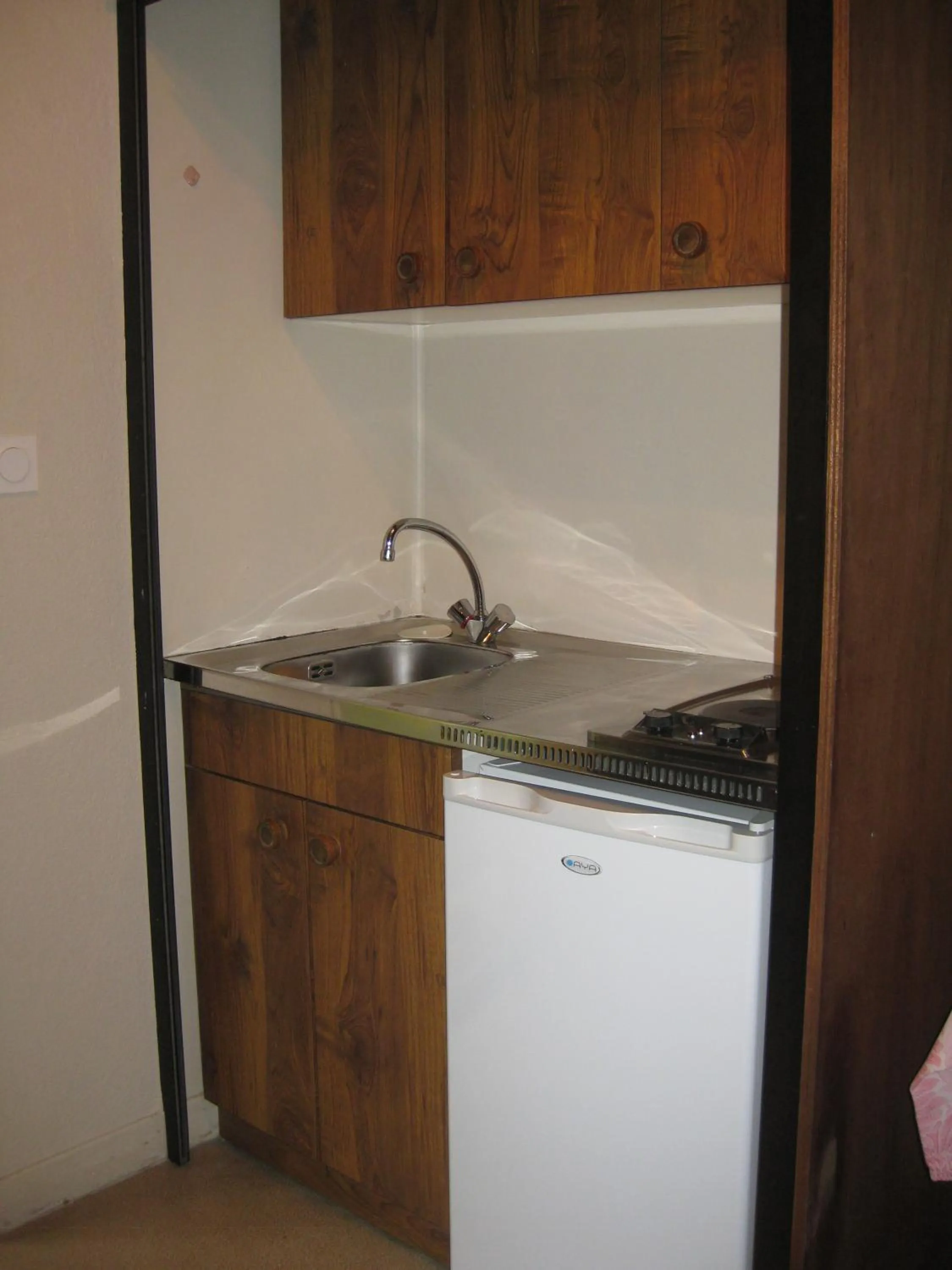 Kitchen or kitchenette in Hôtel Les Pavillons du Golf