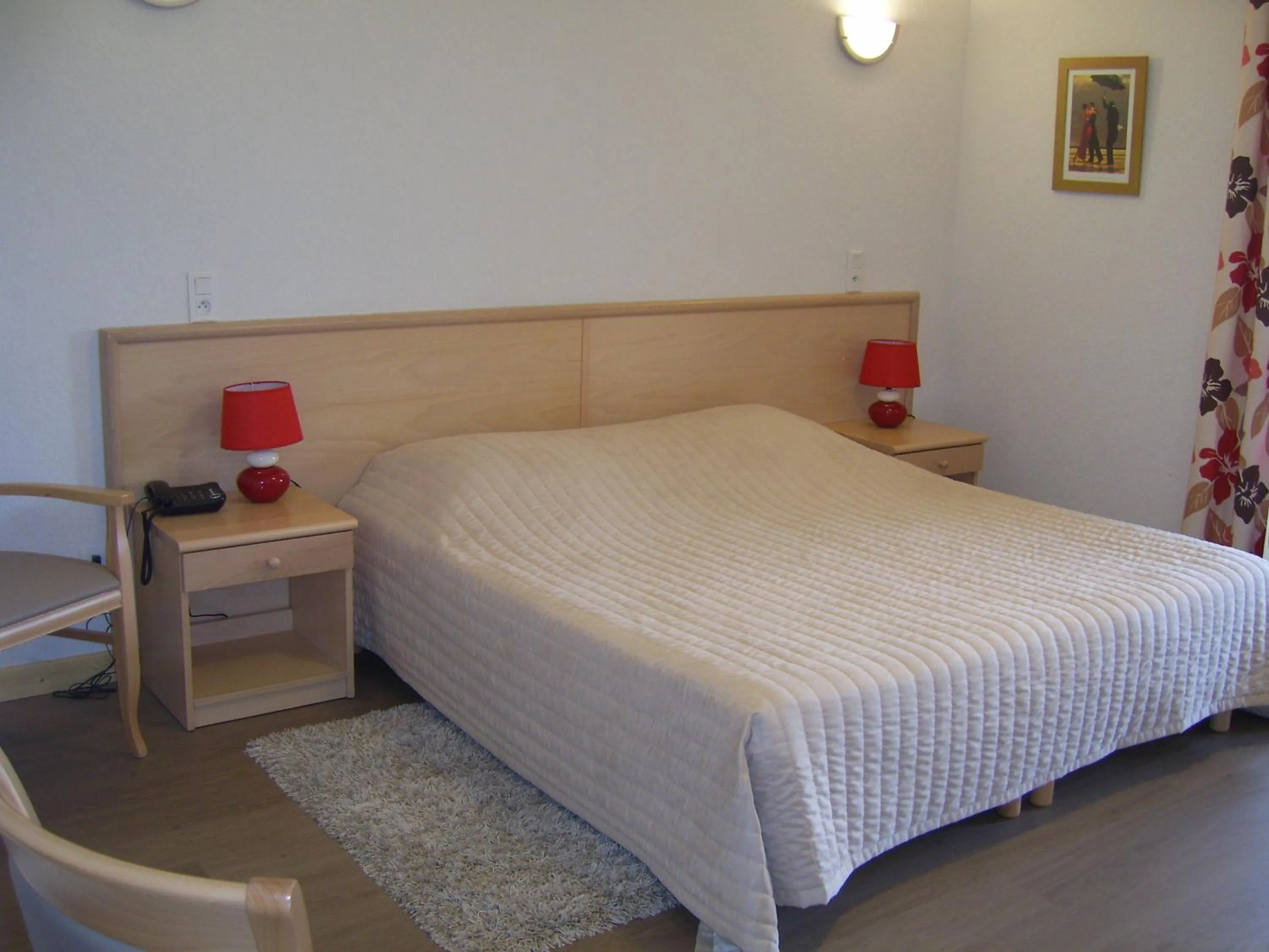 Photo of the whole room, Bed in Hôtel Les Pavillons du Golf