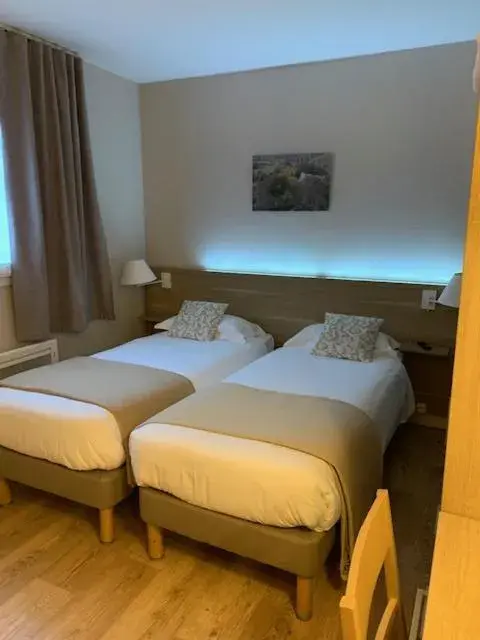 Bed in Logis Hôtel Restaurant Du Lion D'argent Et Des Tanneries Bed in Logis Hôtel Restaurant Du Lion D'argent Et Des Tanneries