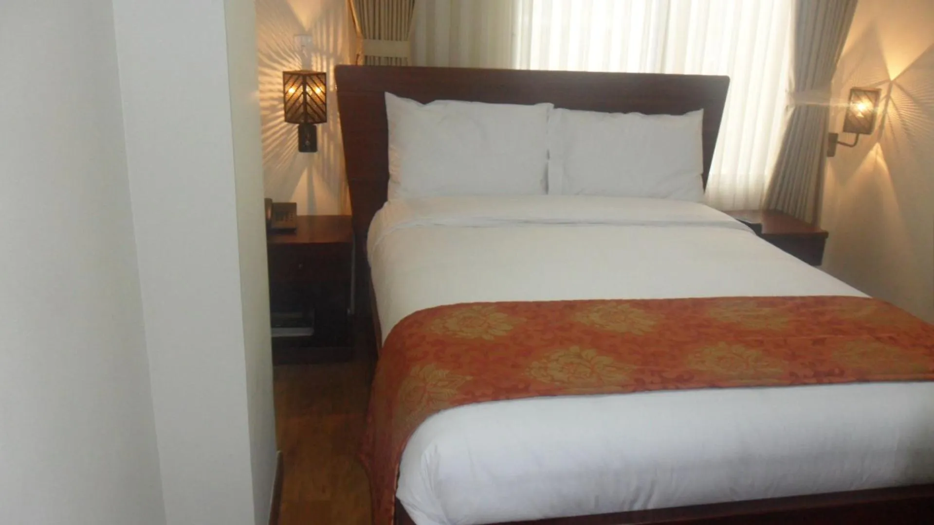 Bed in Hotel Splendor by Friends Company