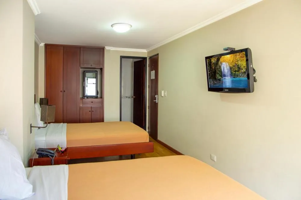 Bed in Hotel Splendor by Friends Company