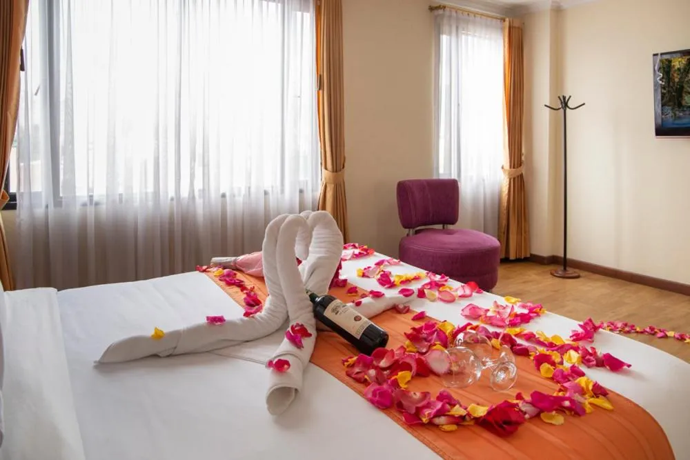 Bed in Hotel Splendor by Friends Company