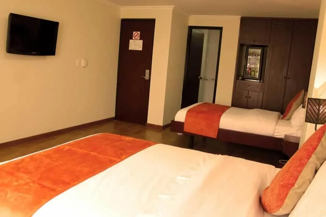 Bed in Hotel Splendor by Friends Company