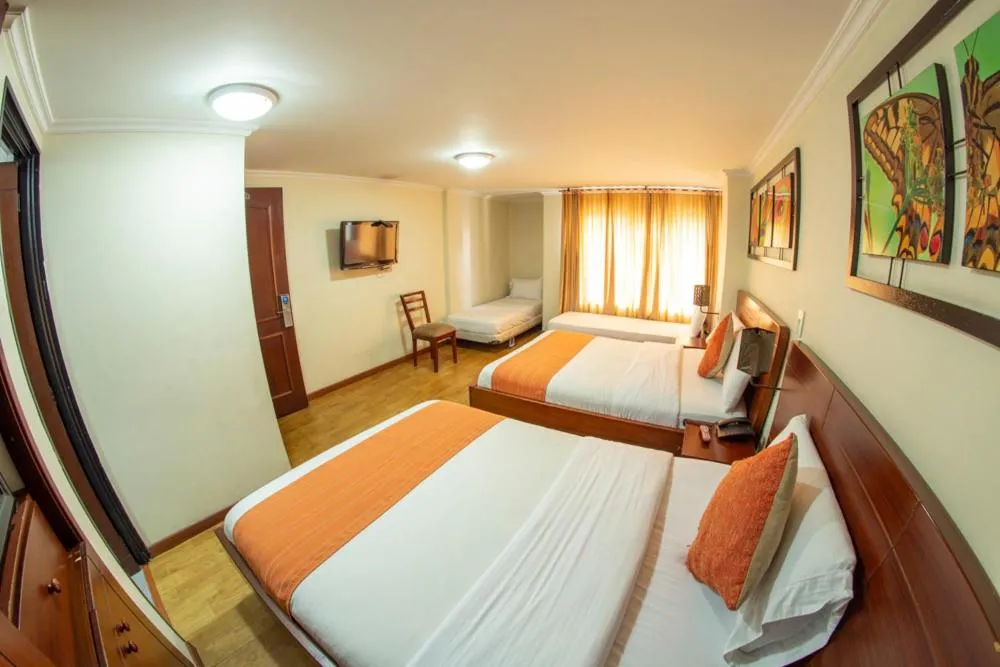 Bed in Hotel Splendor by Friends Company