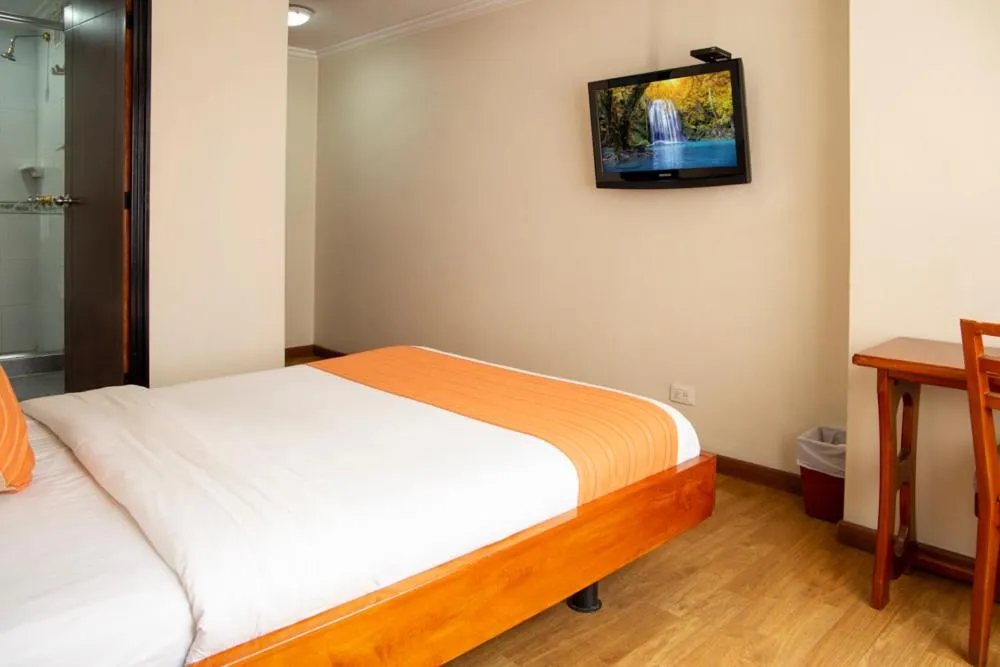 Bed in Hotel Splendor by Friends Company