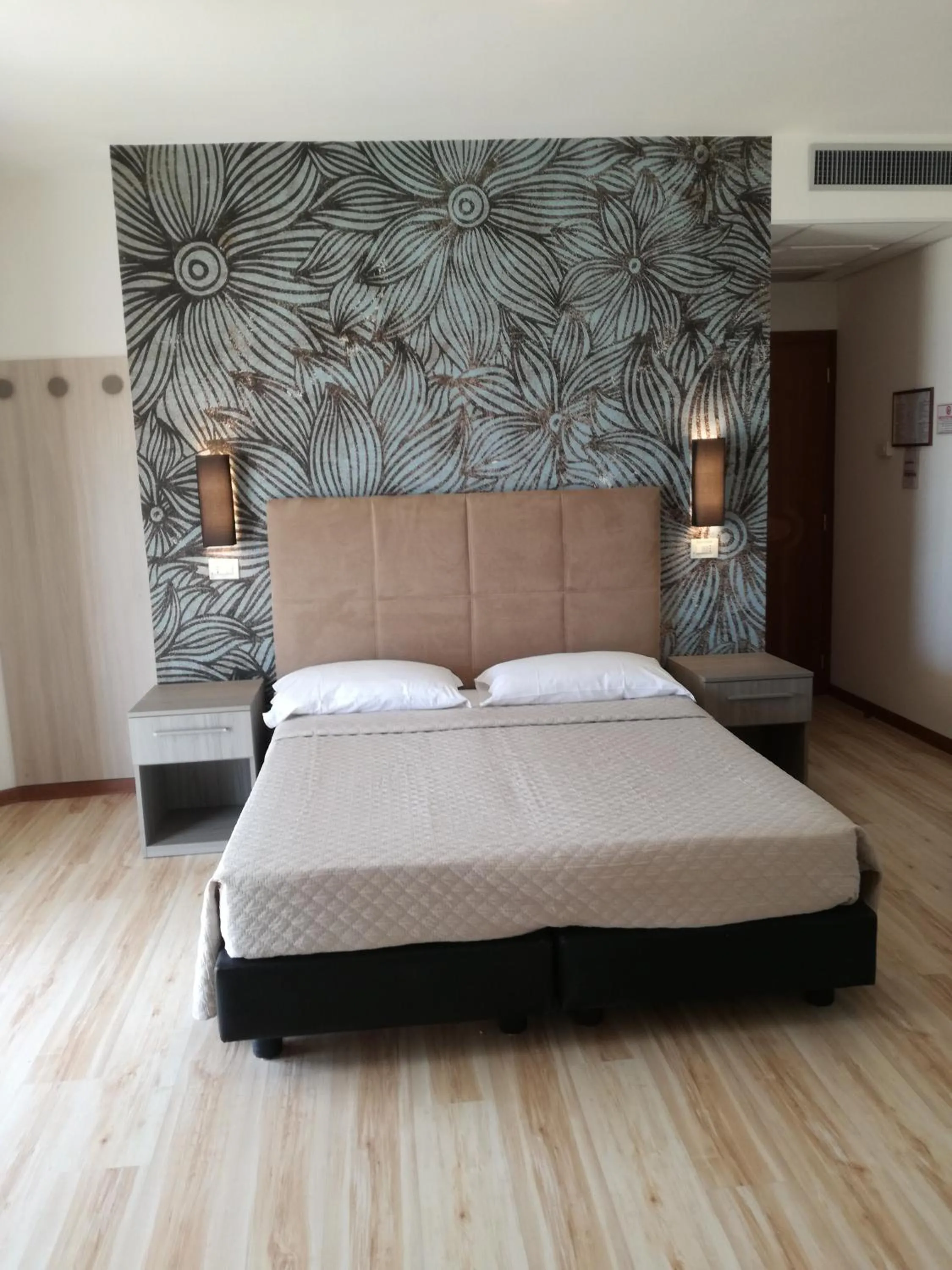 Bed in Hotel Excelsior