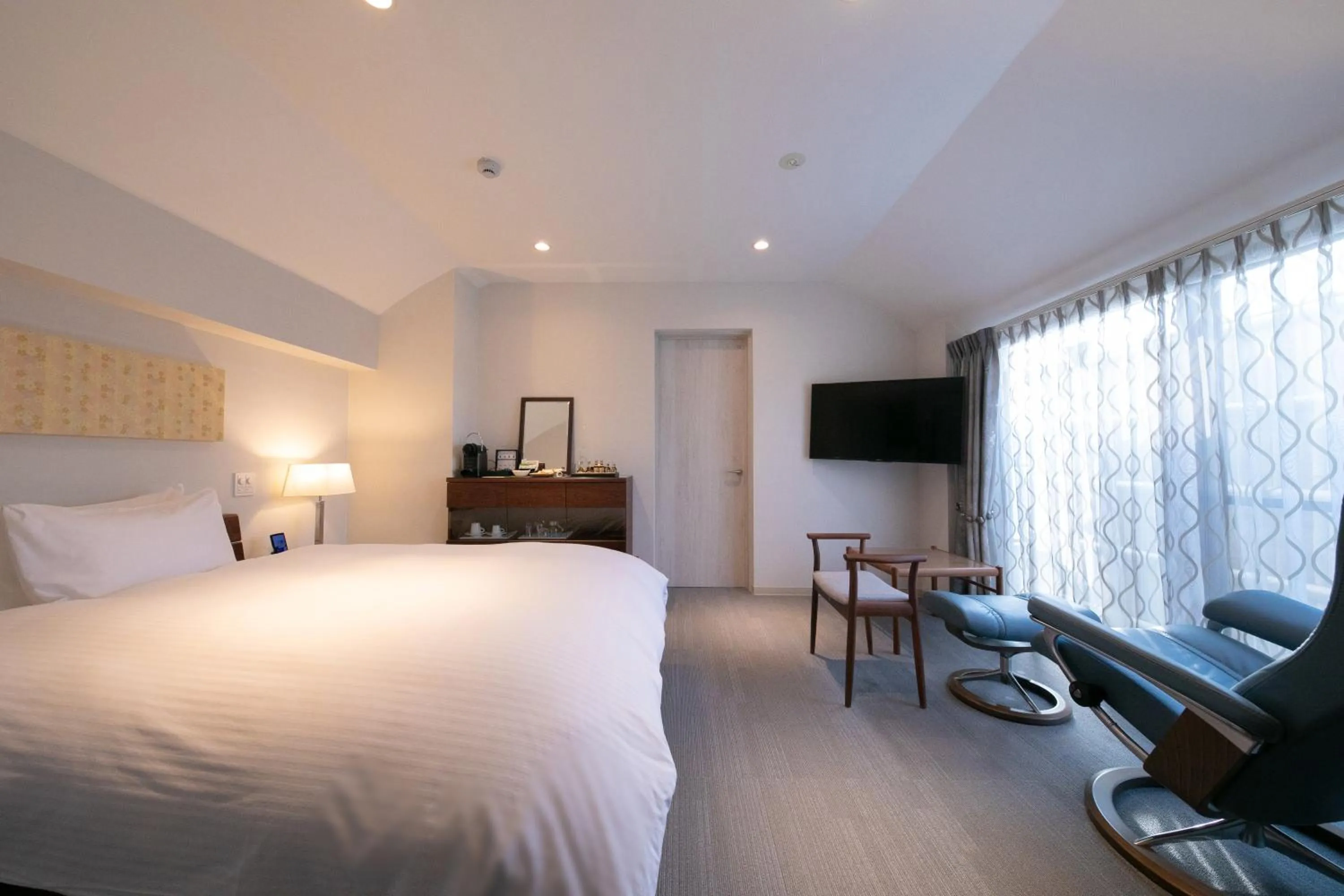 Photo of the whole room, Bed in Riverte Kyoto Kamogawa