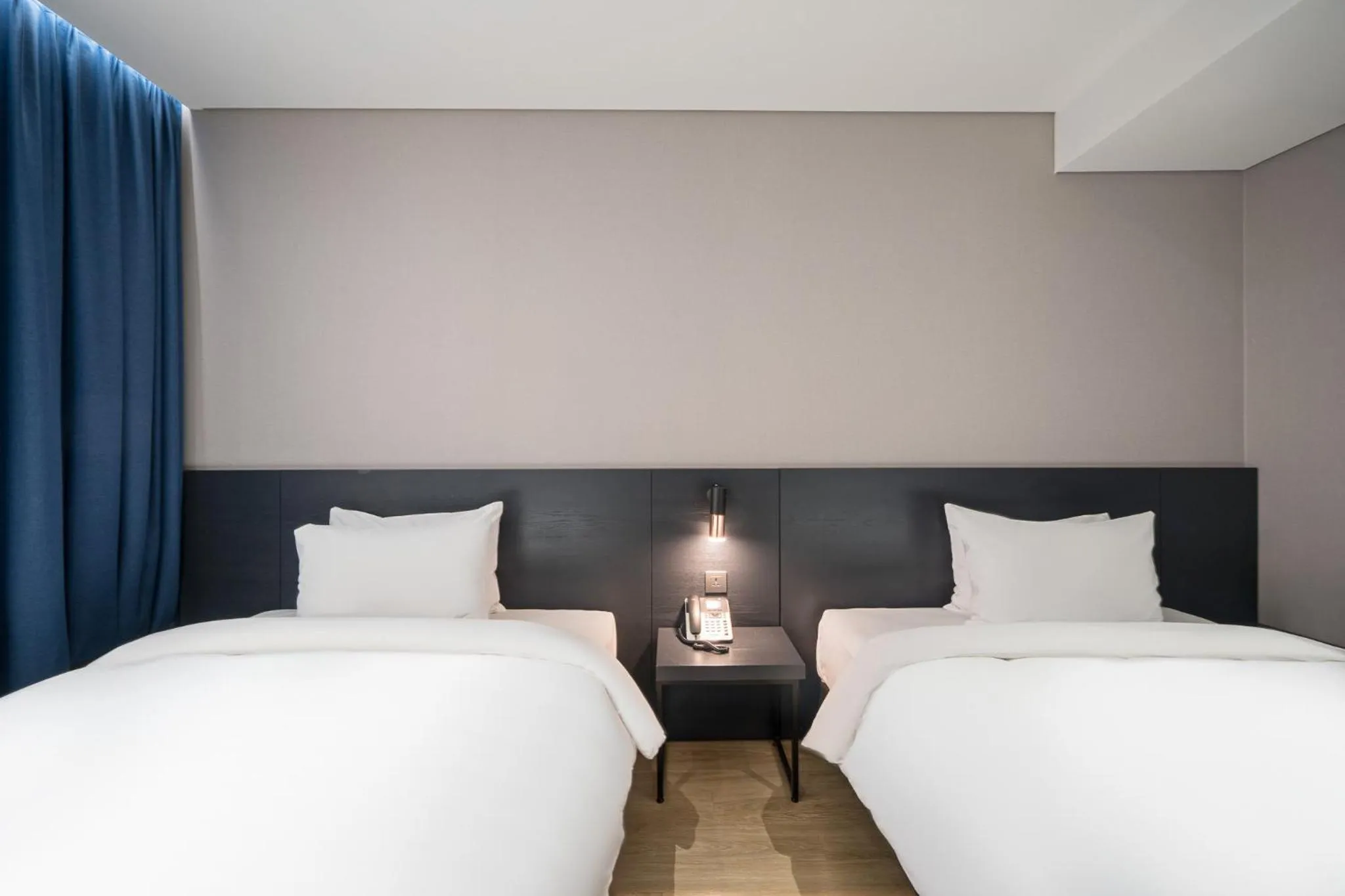 Bed in Rivertain Hotel Gyeongju