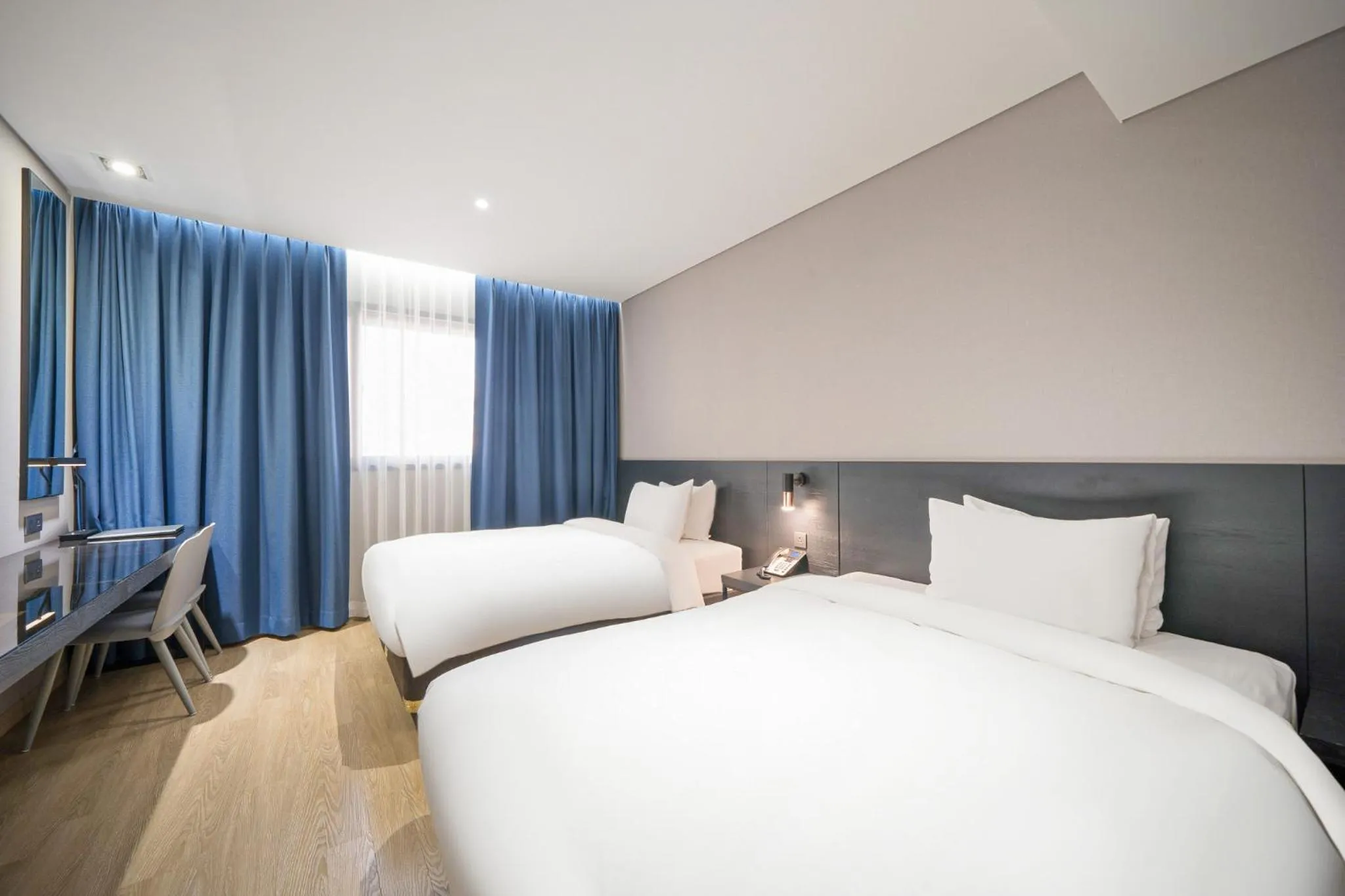 Bed in Rivertain Hotel Gyeongju