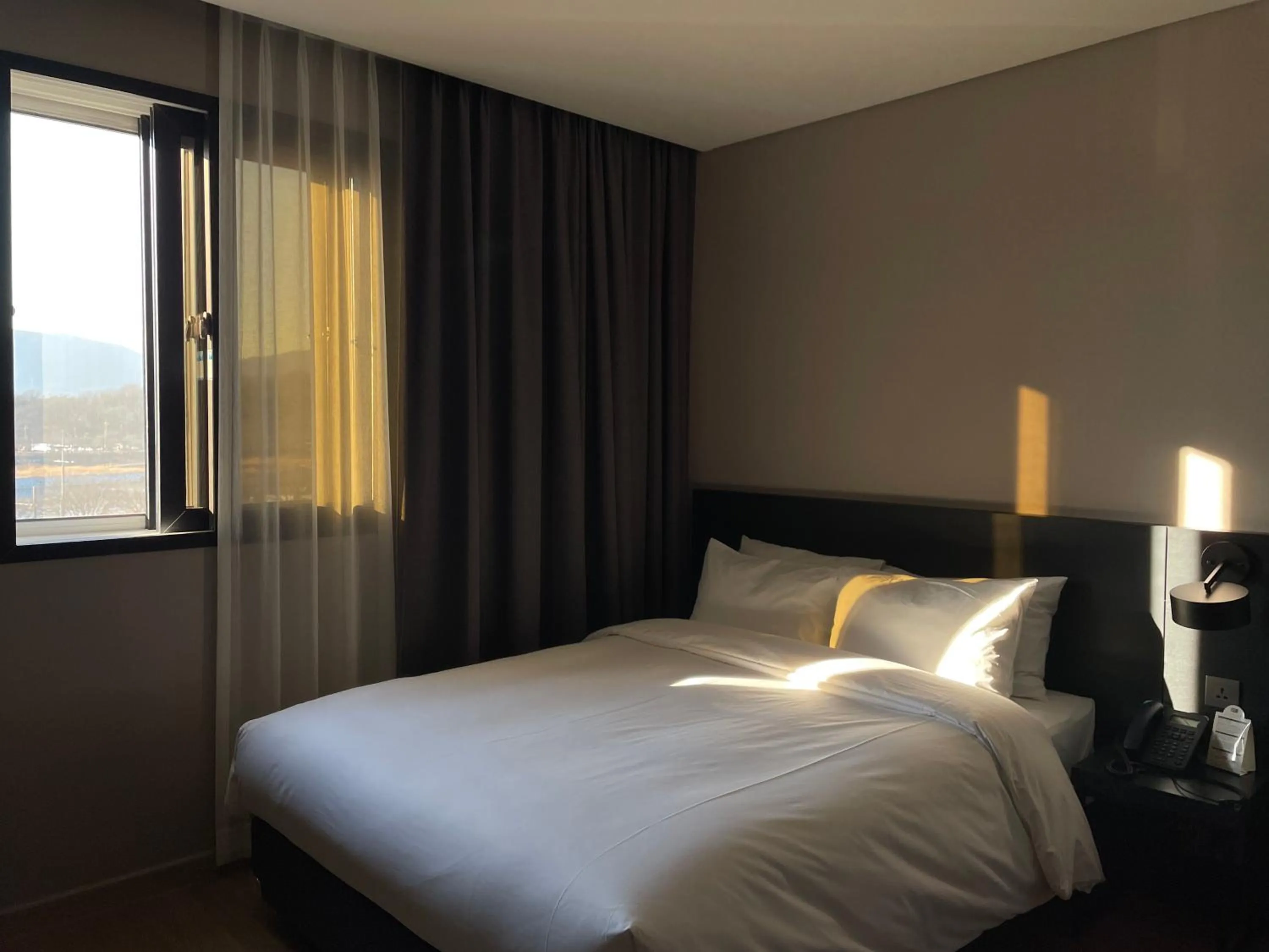 Bed in Rivertain Hotel Gyeongju