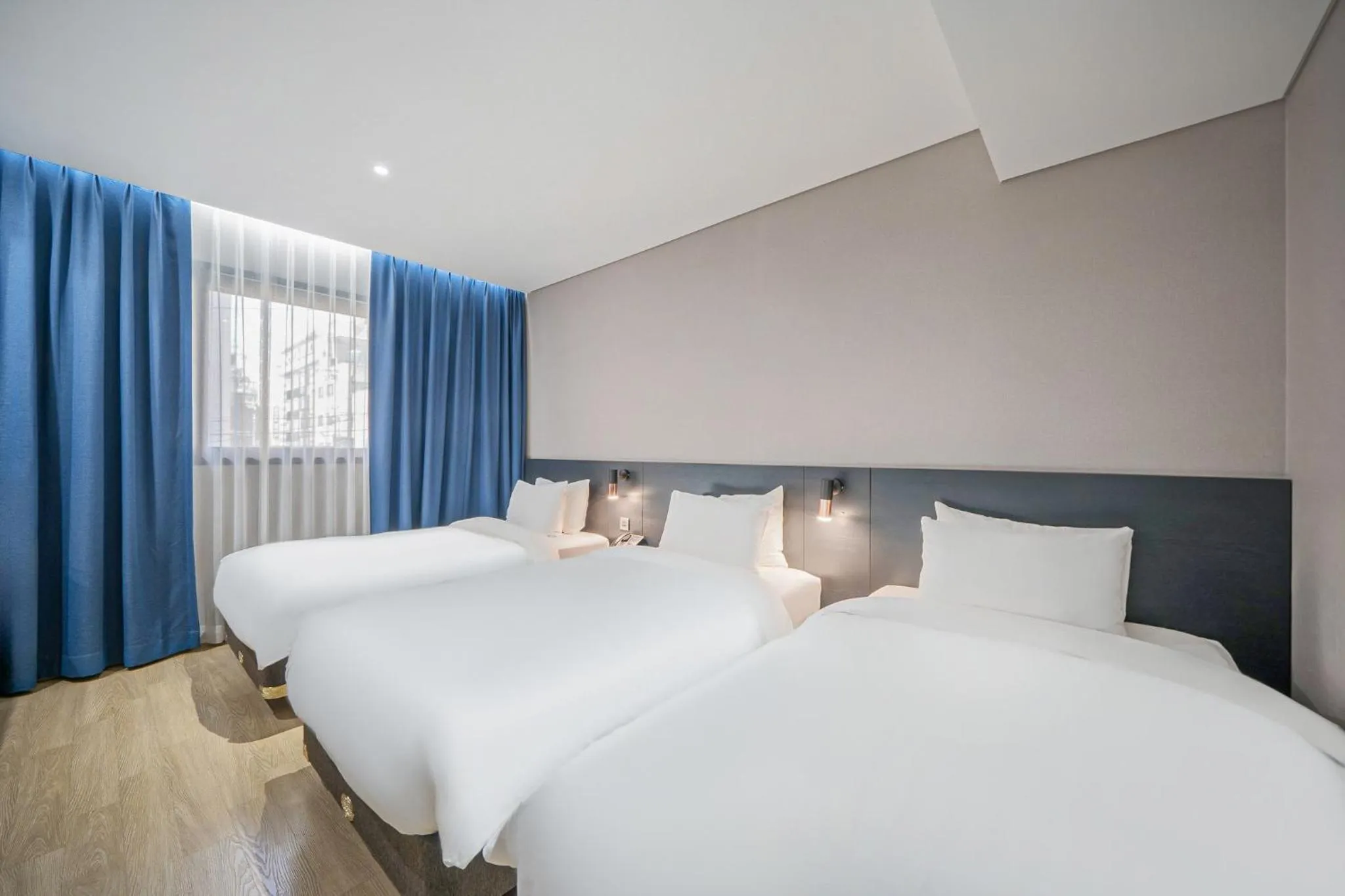 Bed in Rivertain Hotel Gyeongju