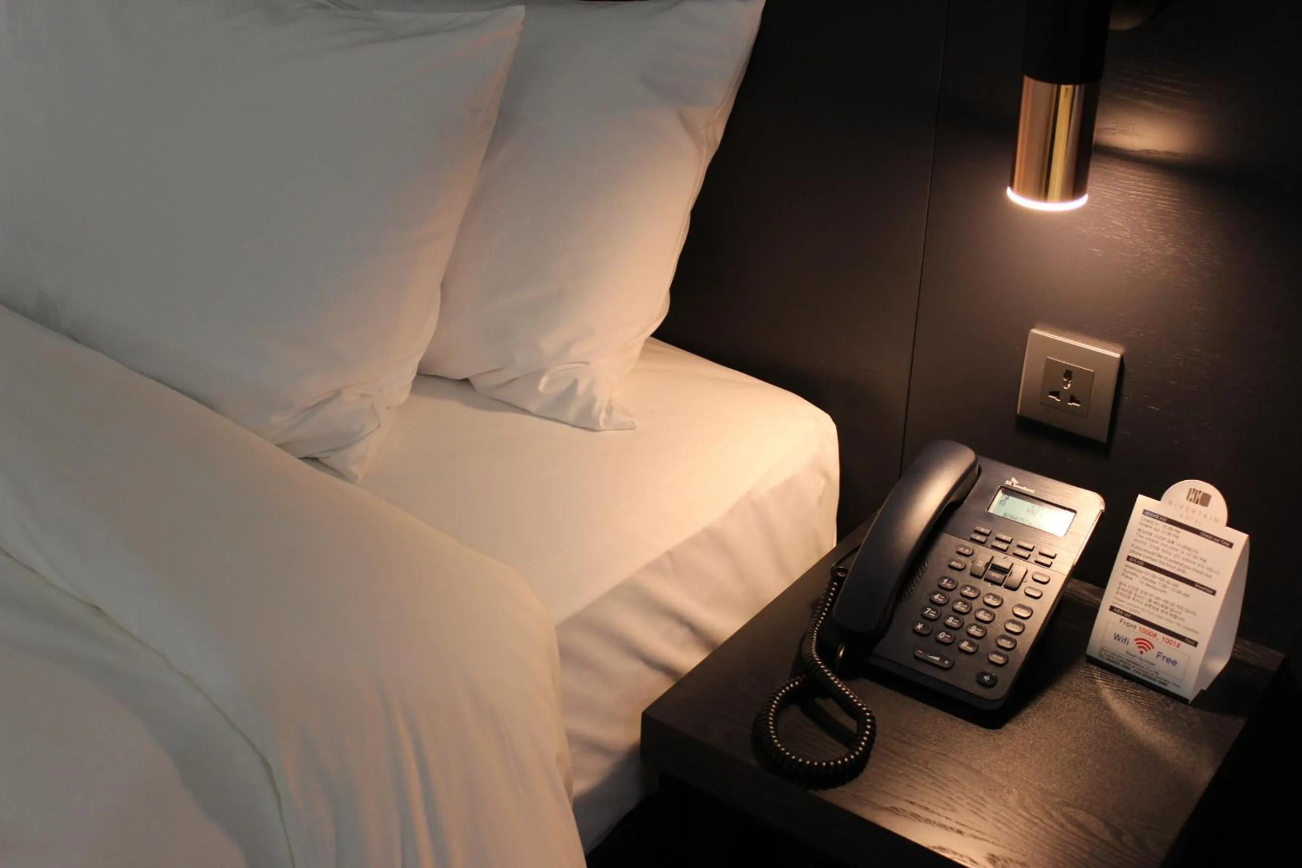 Bed in Rivertain Hotel Gyeongju