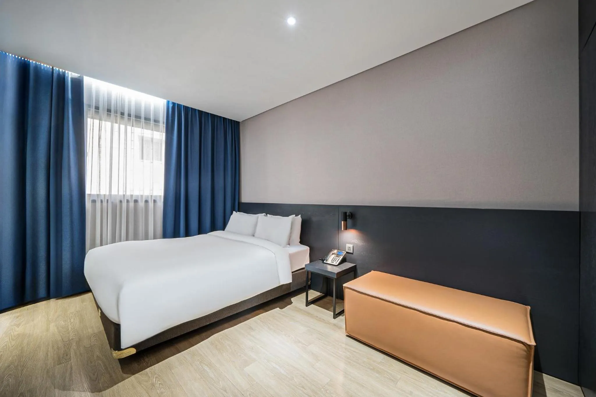 Bed in Rivertain Hotel Gyeongju