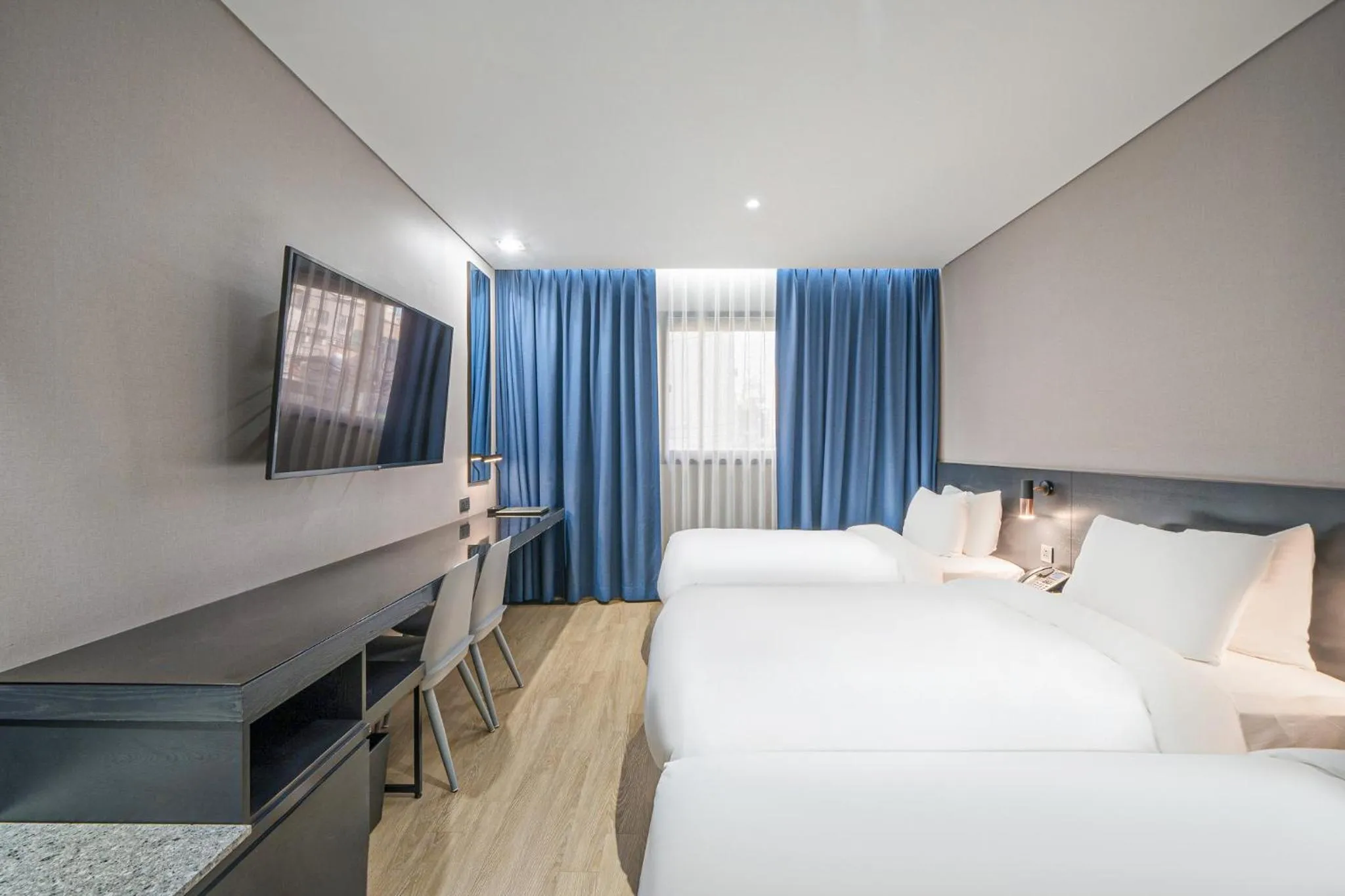 Bed in Rivertain Hotel Gyeongju