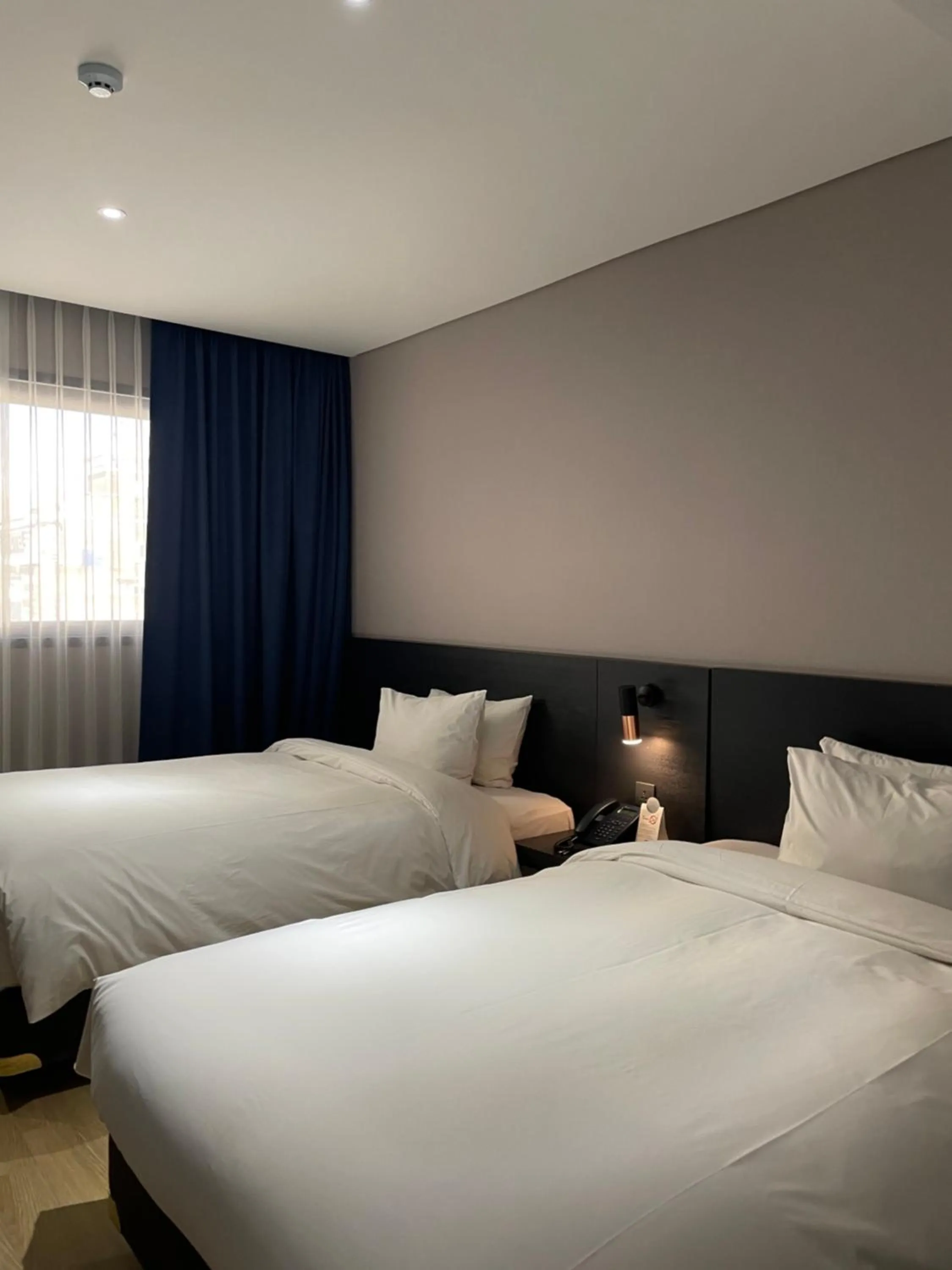 Bed in Rivertain Hotel Gyeongju