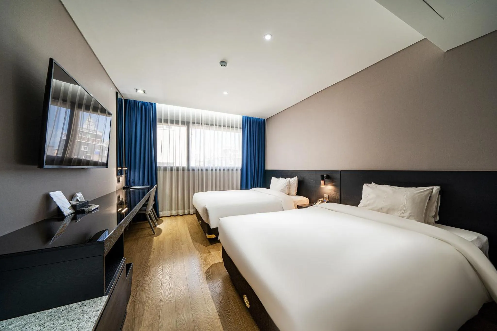 Bed in Rivertain Hotel Gyeongju