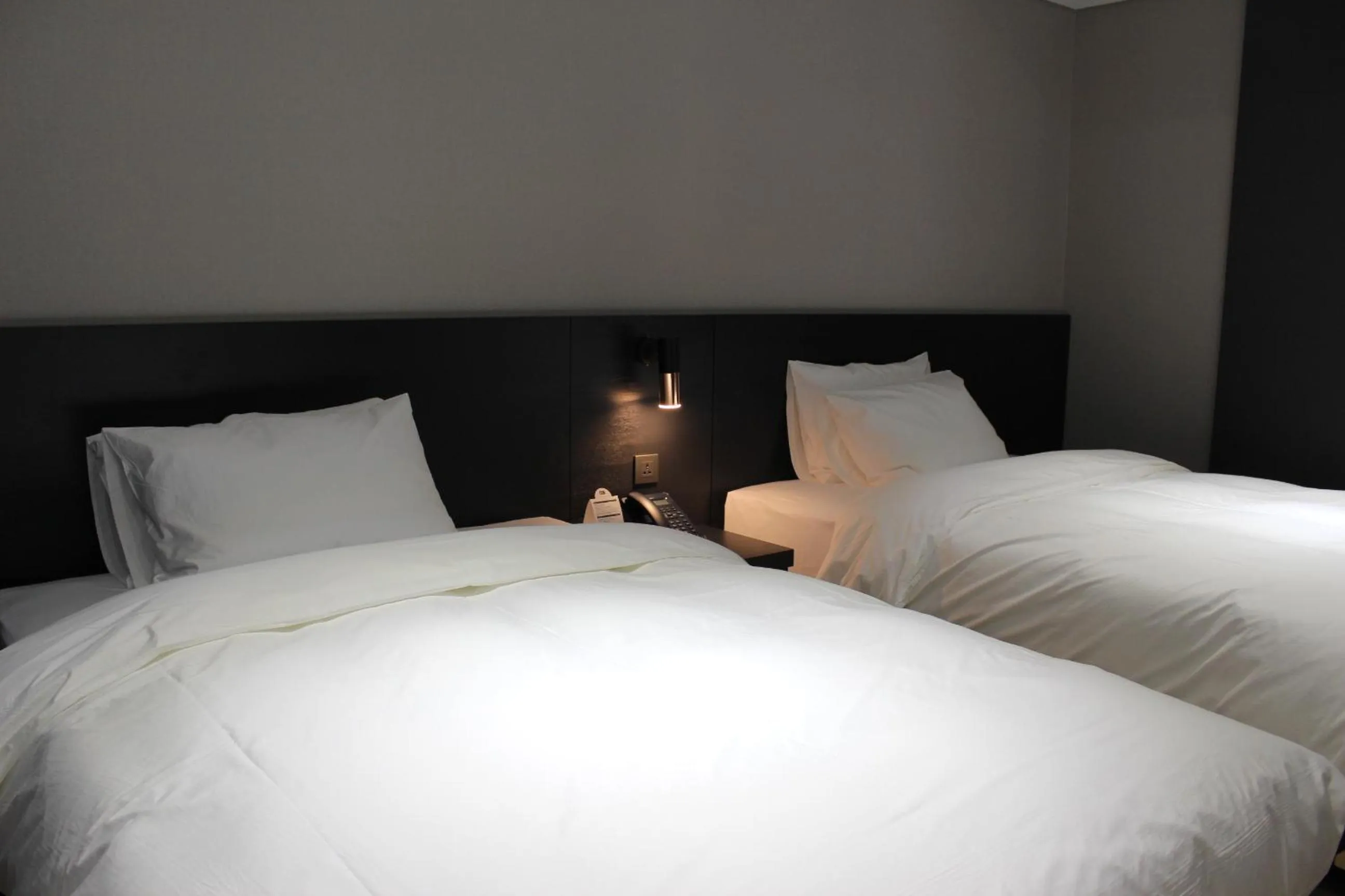Bed in Rivertain Hotel Gyeongju