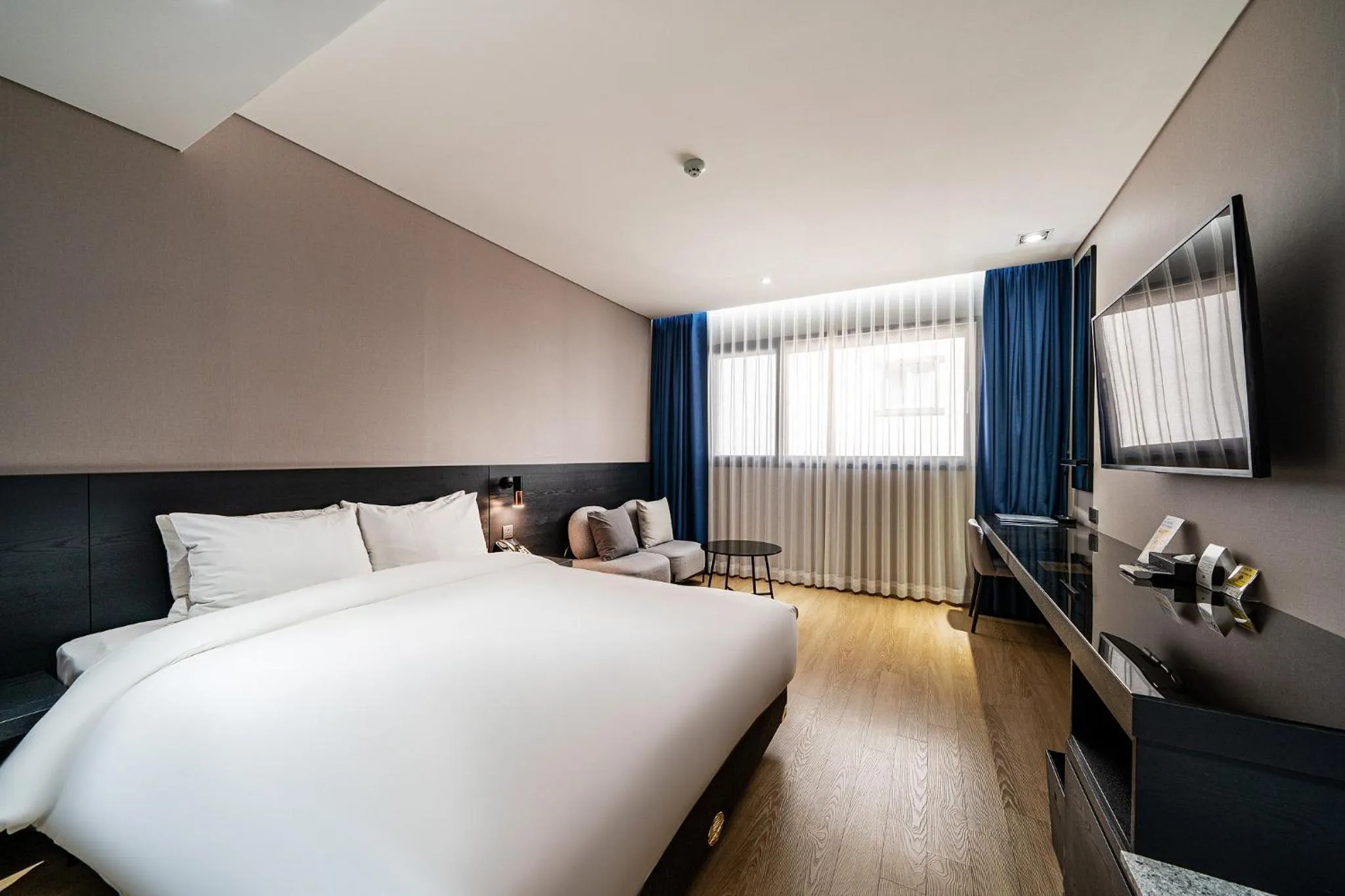 Bed in Rivertain Hotel Gyeongju