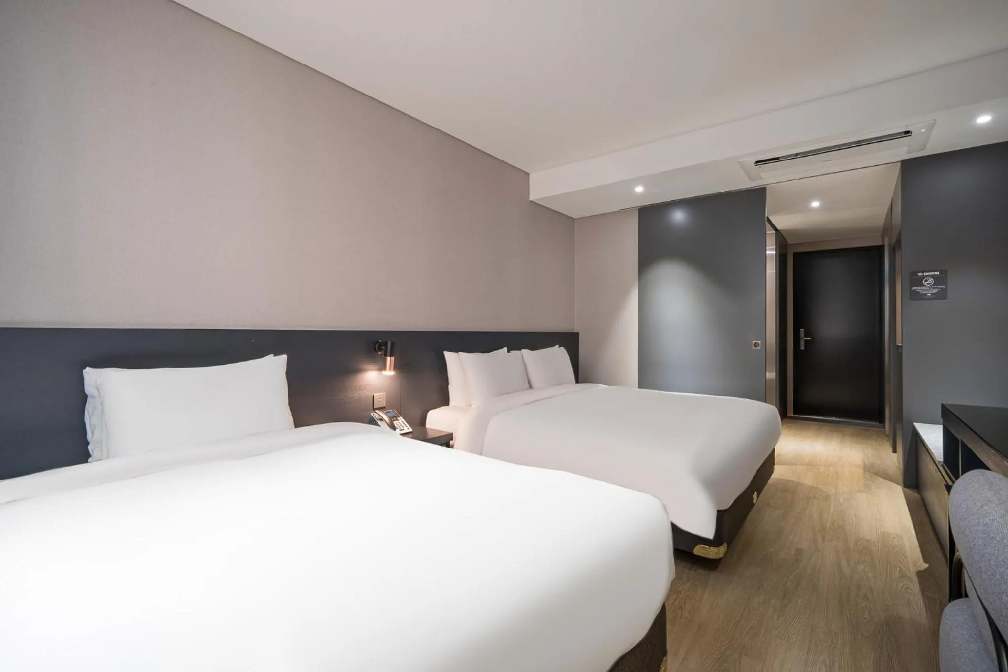 Bed in Rivertain Hotel Gyeongju