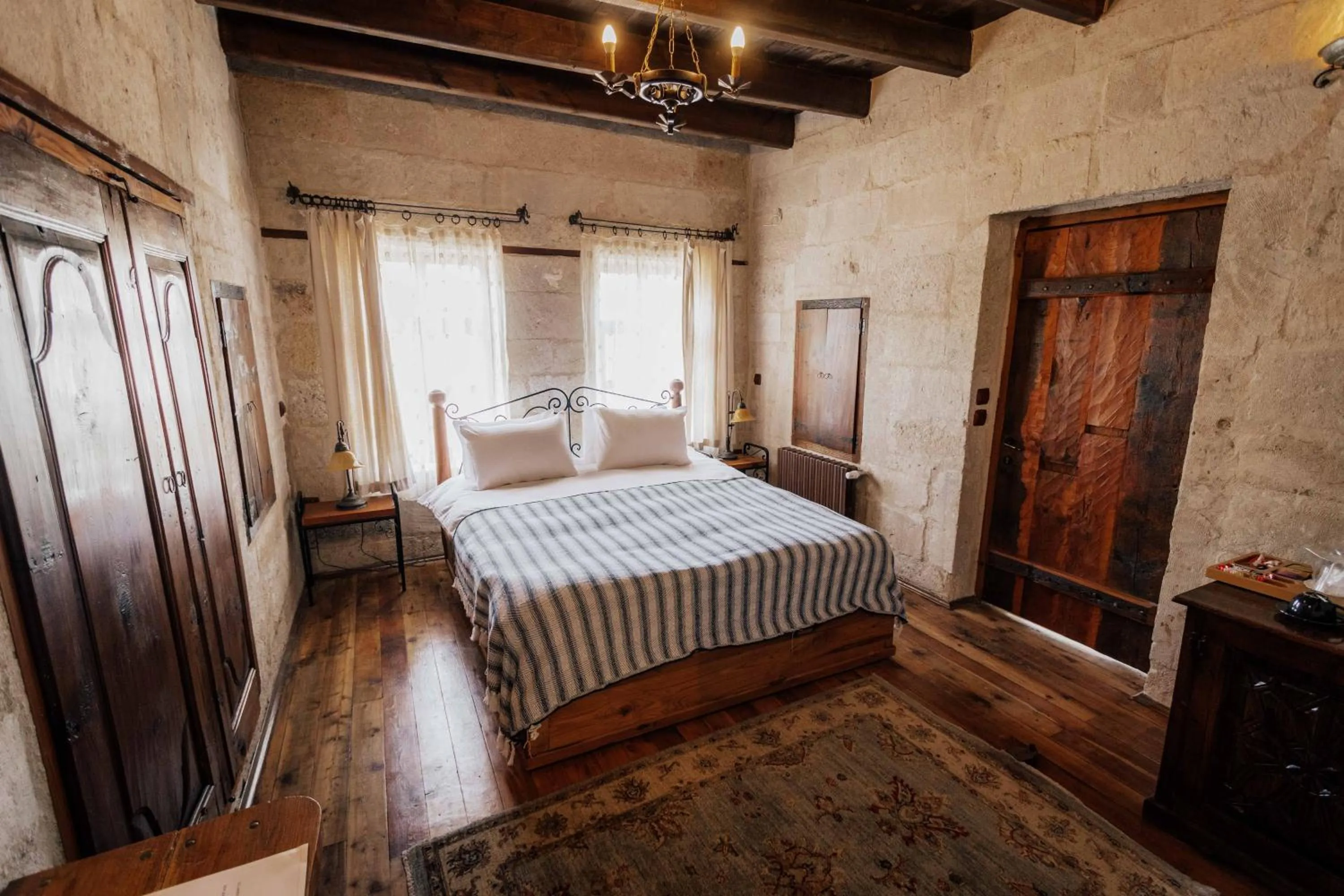 Bed in Aza Cave Cappadocia Adult Hotel