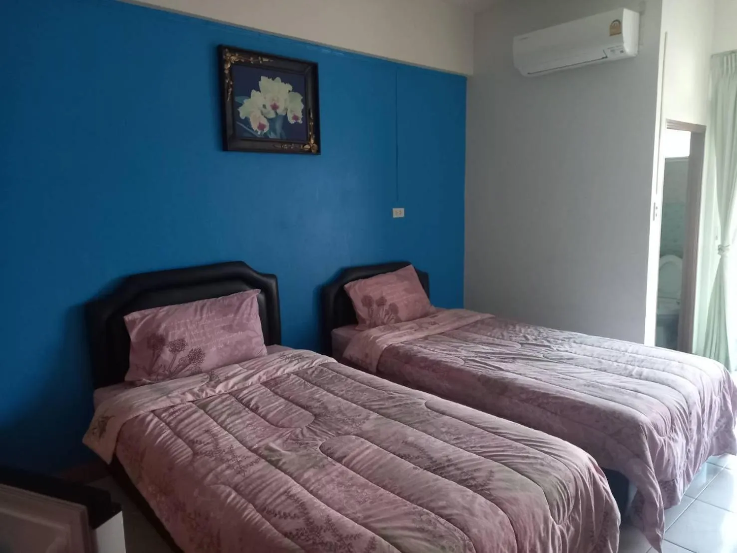 Bed in Vanlisut Hotel Ngamwongwan