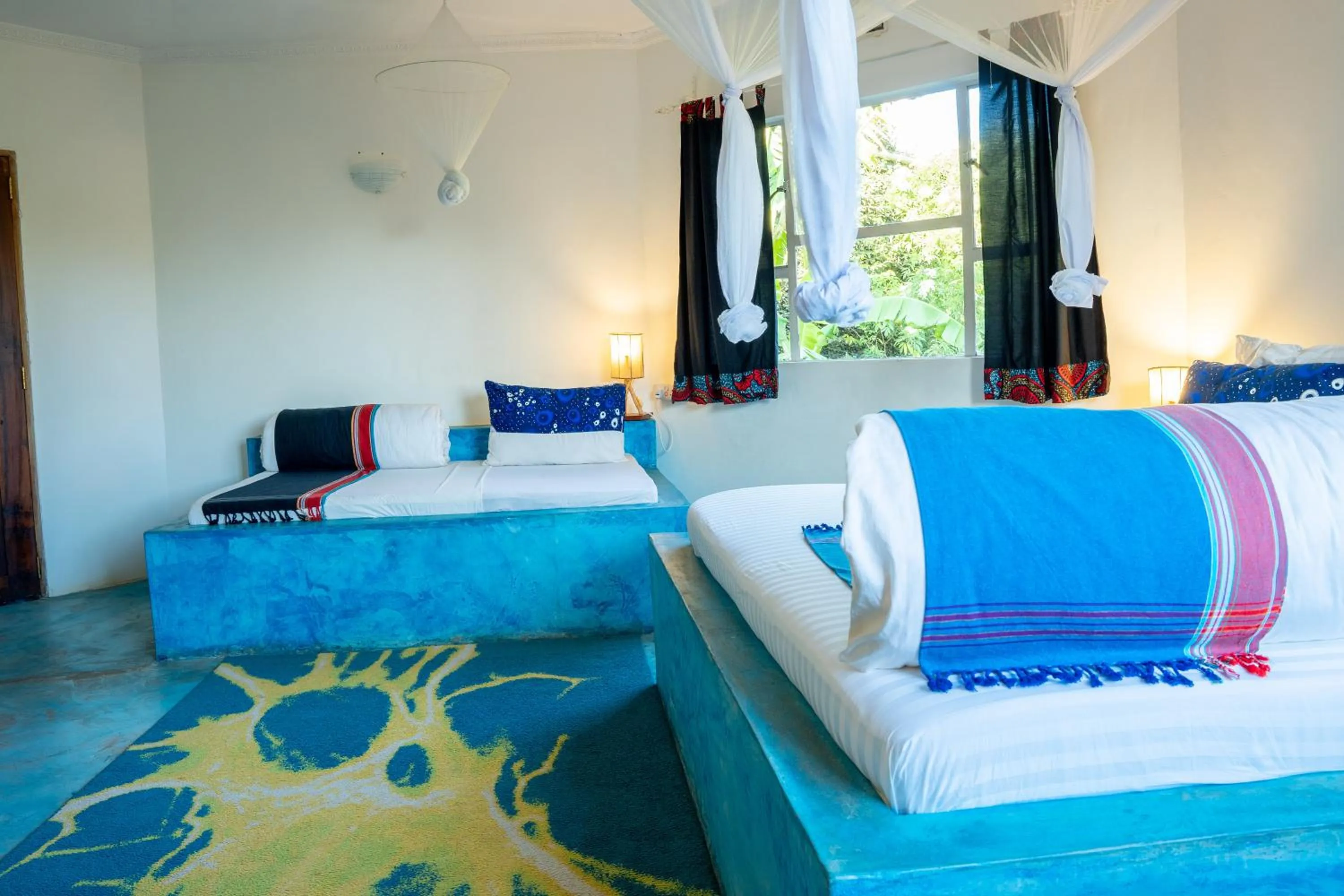 Bed in Dan Stam Hotel