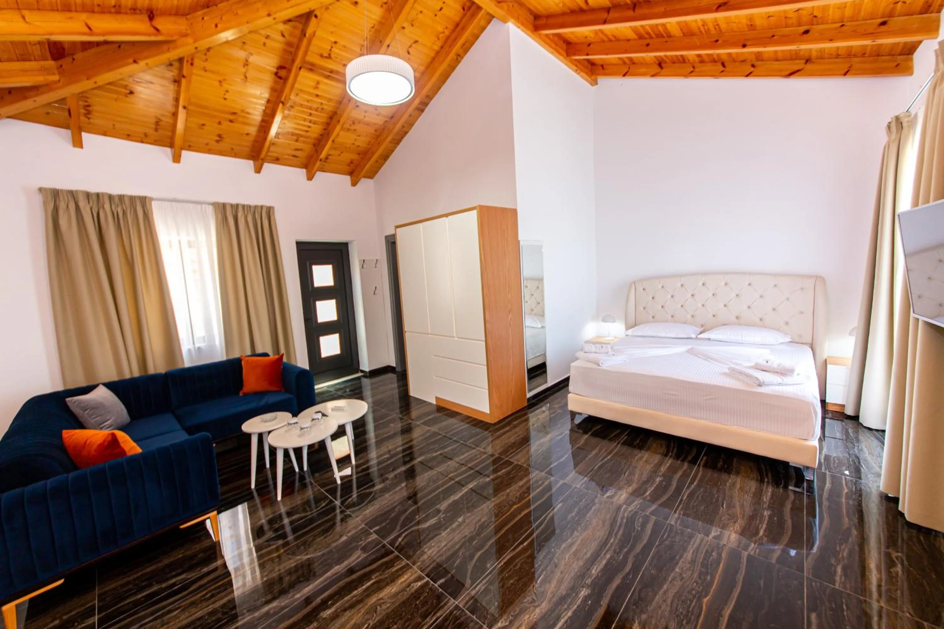 Living room, Bed in Santa Oliva Suites