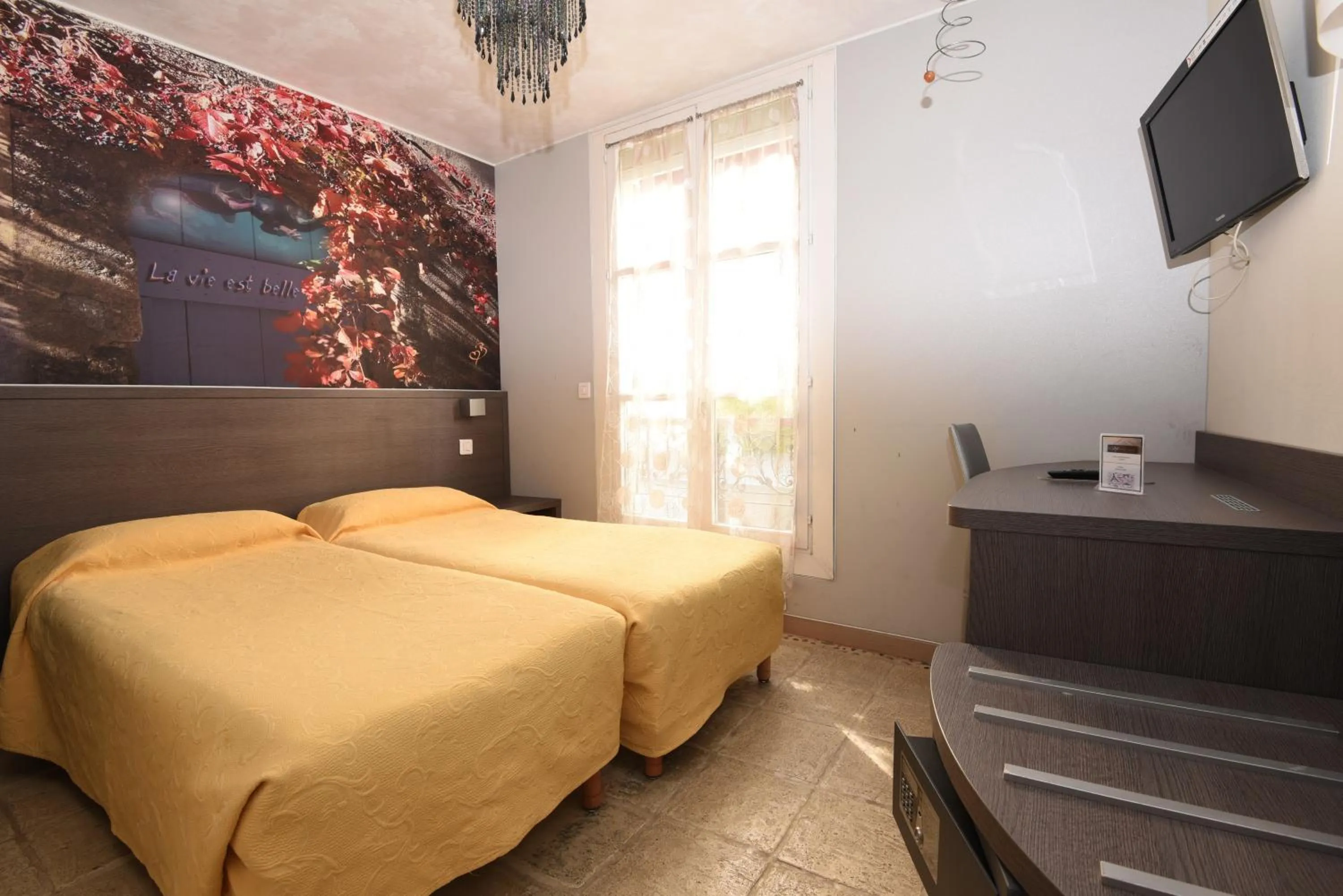 Bed in Amélie Hotel