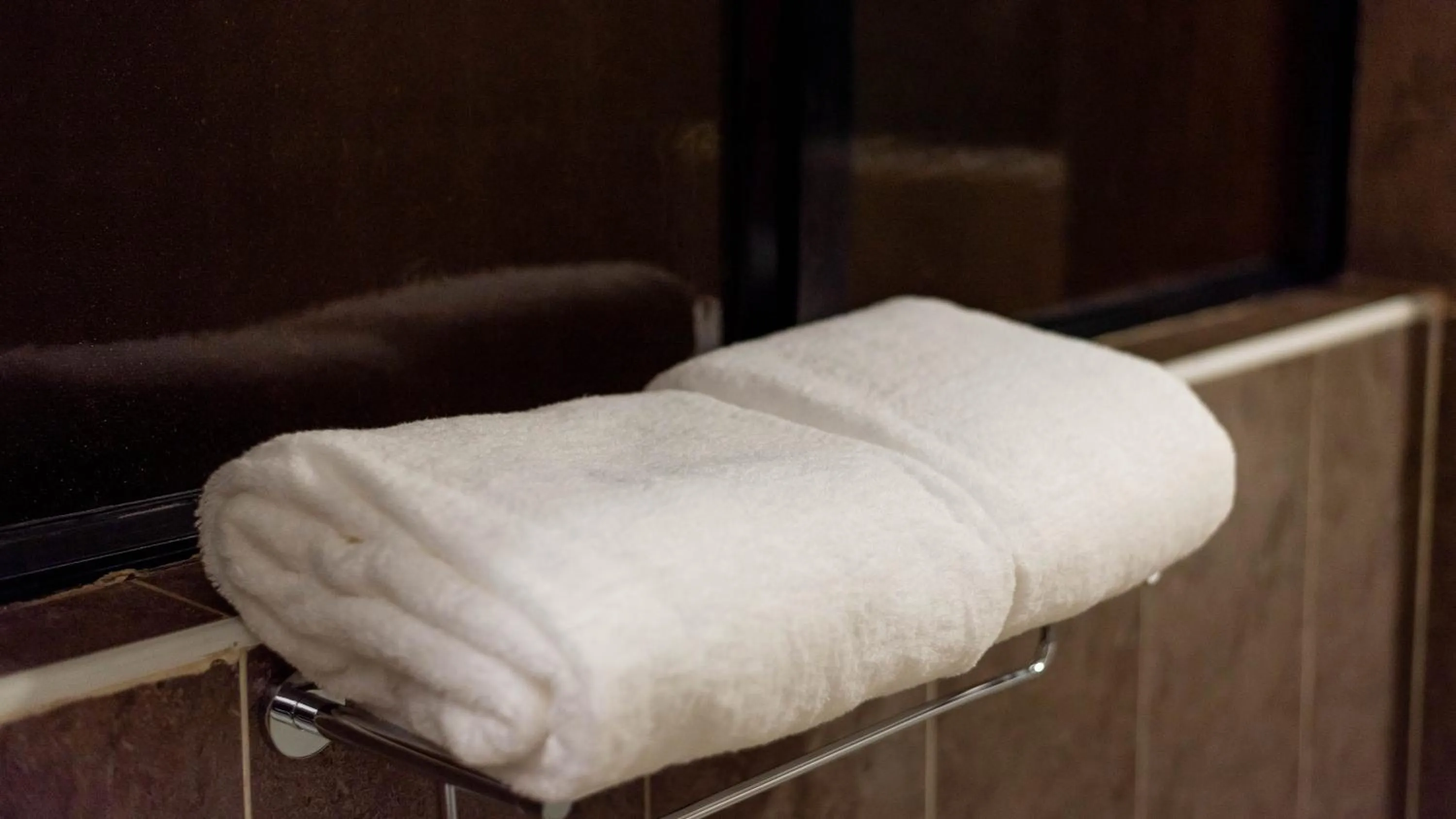 Bathroom in CySuites Apartment Hotel