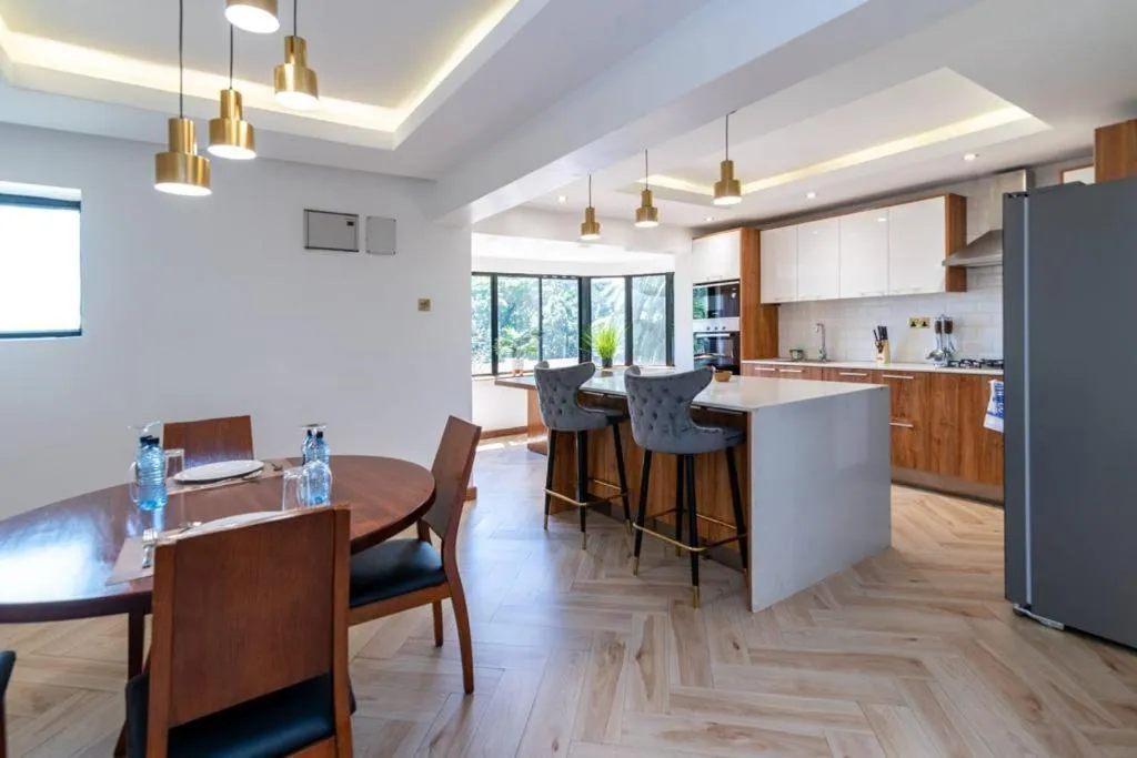 Kitchen or kitchenette in CySuites Apartment Hotel