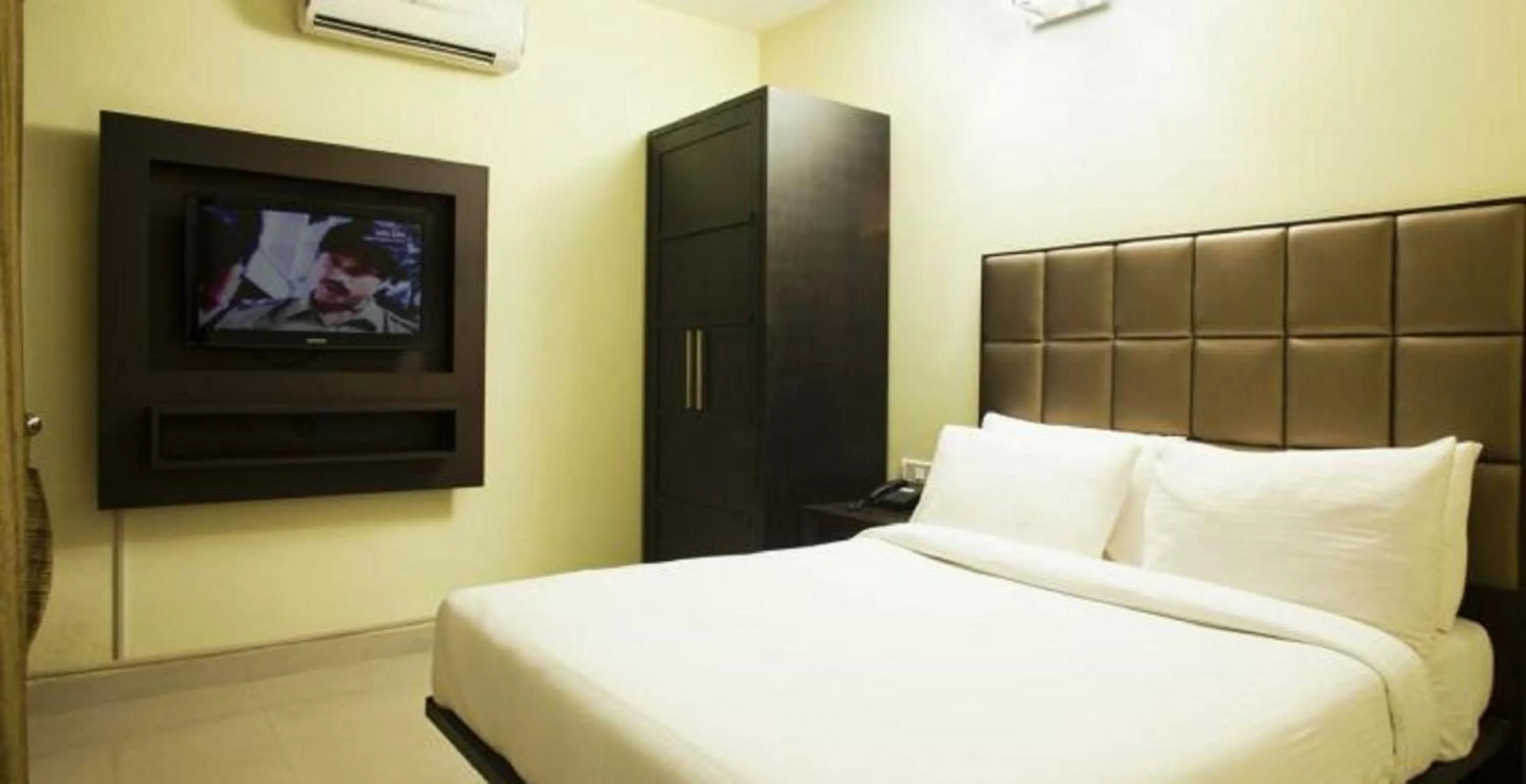 Bed in The Golden Suites & Spa