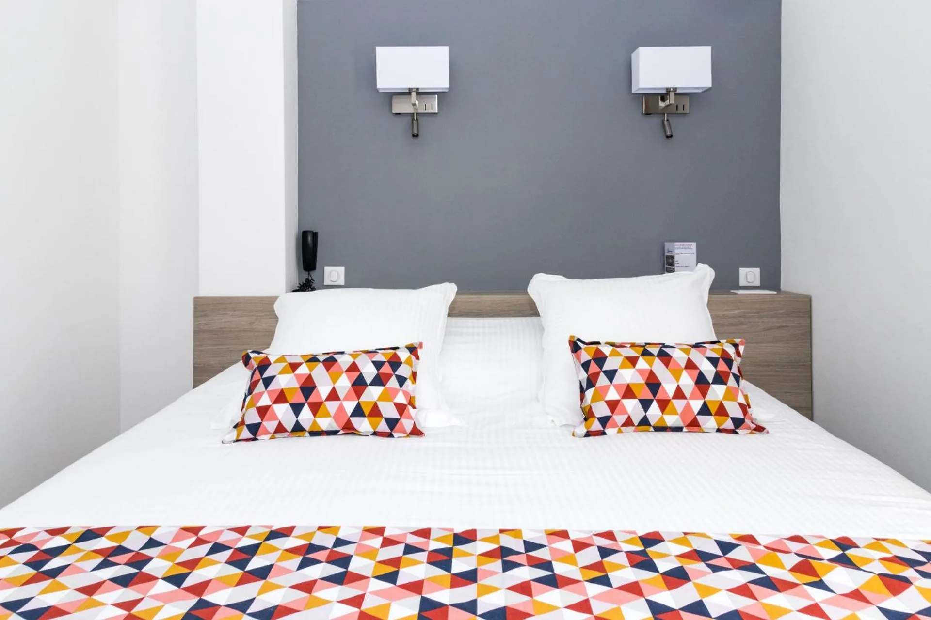 Bed in Hôtel Le Rabelais