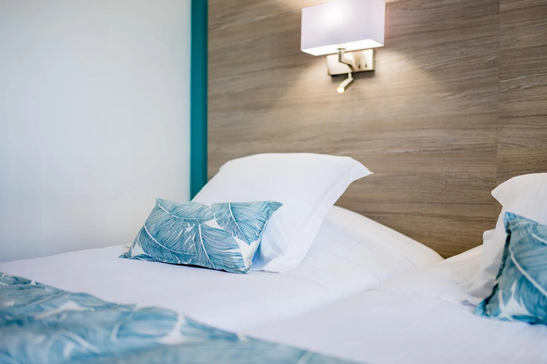 Bed in Hôtel Le Rabelais