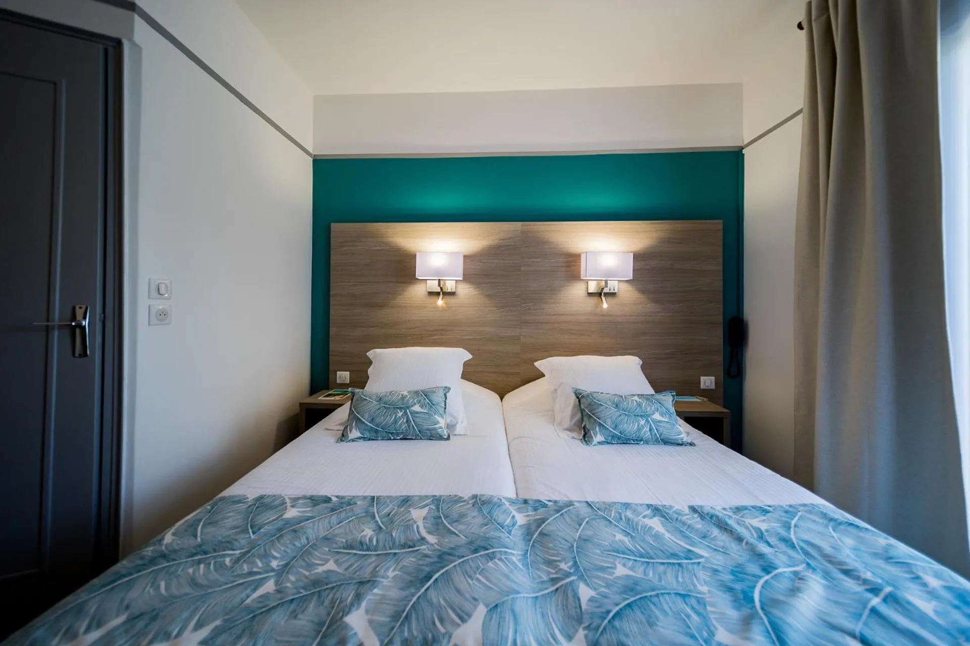 Bed in Hôtel Le Rabelais