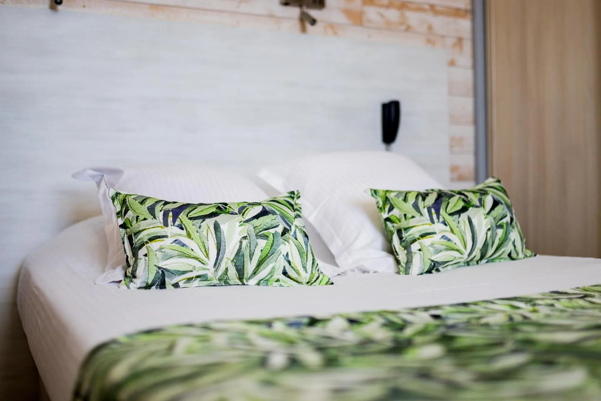 Bed in Hôtel Le Rabelais