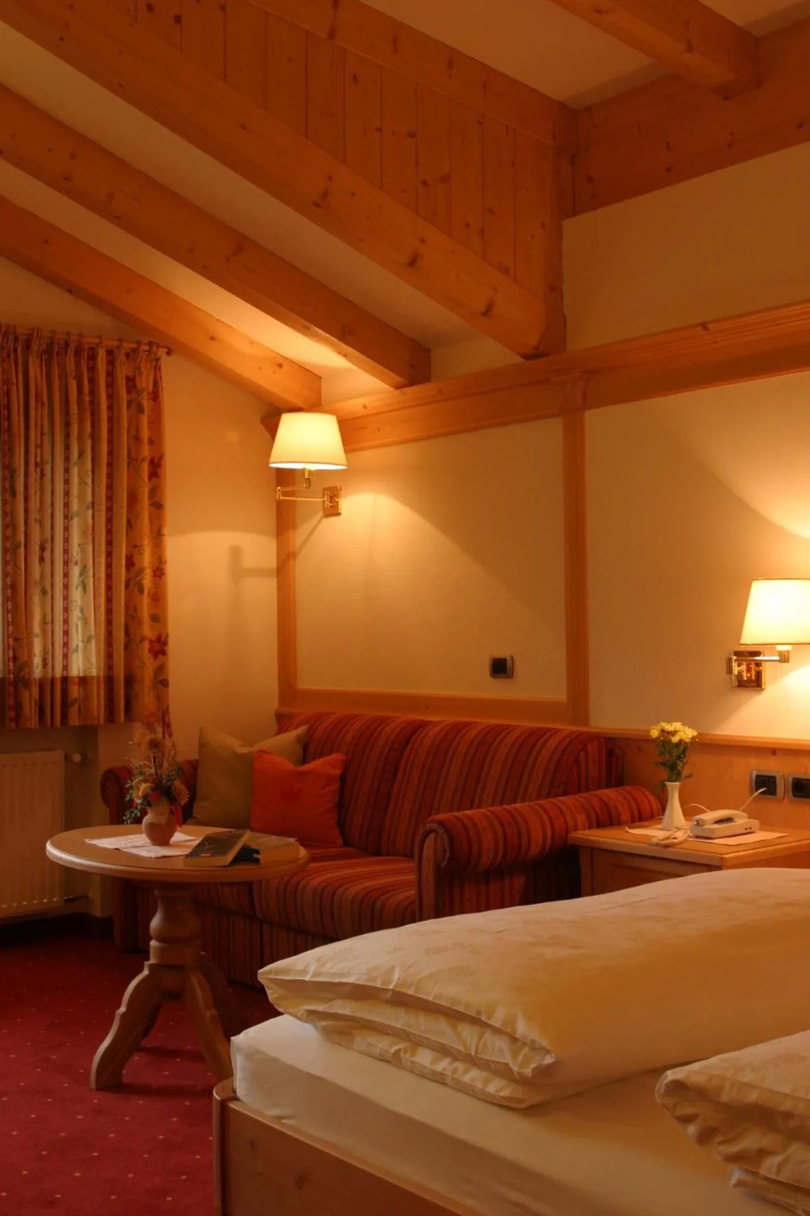 Seating area, Bed in Hotel Markushof 3***S