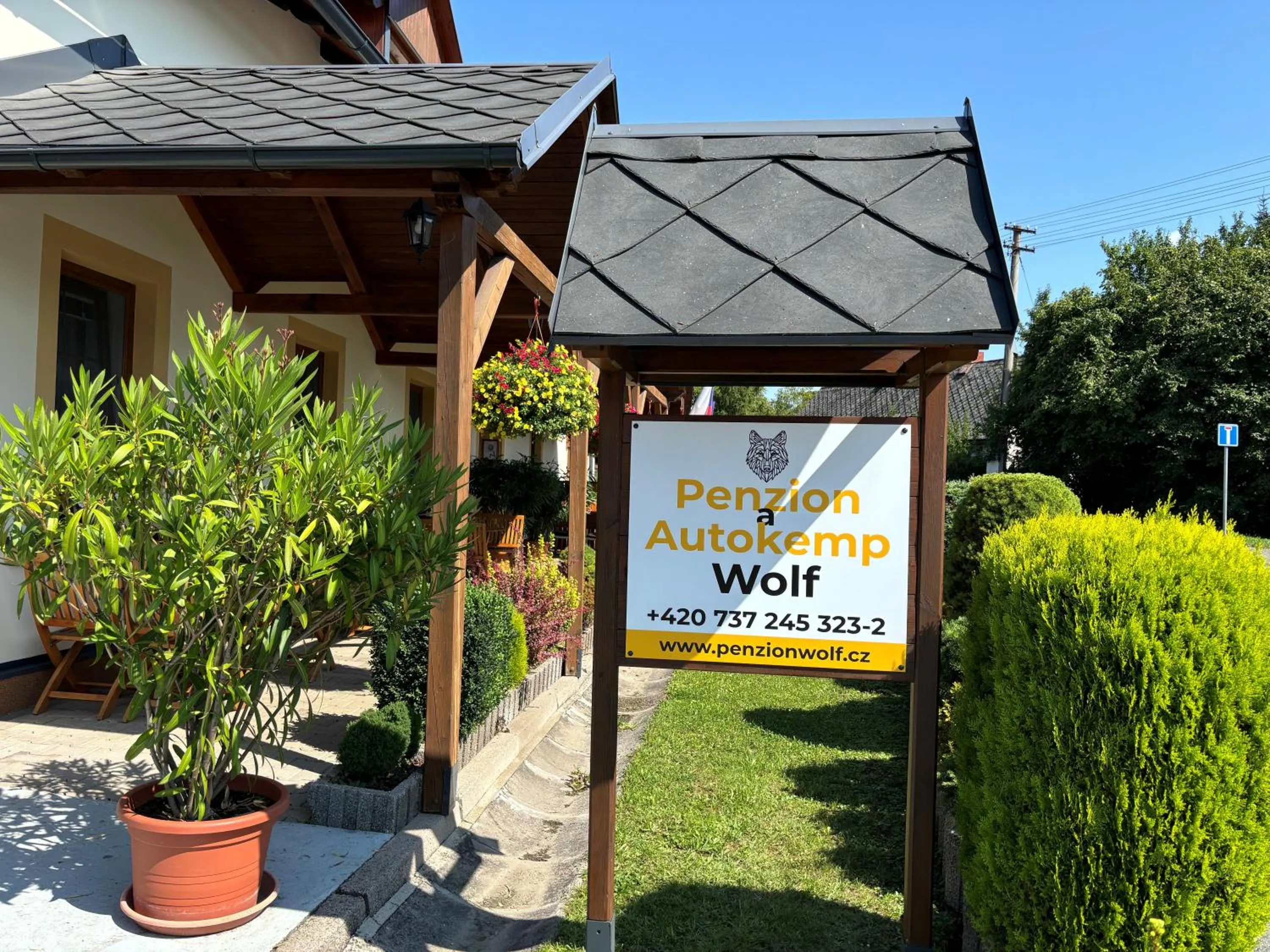 Property logo or sign in Penzion a autokemp Wolf