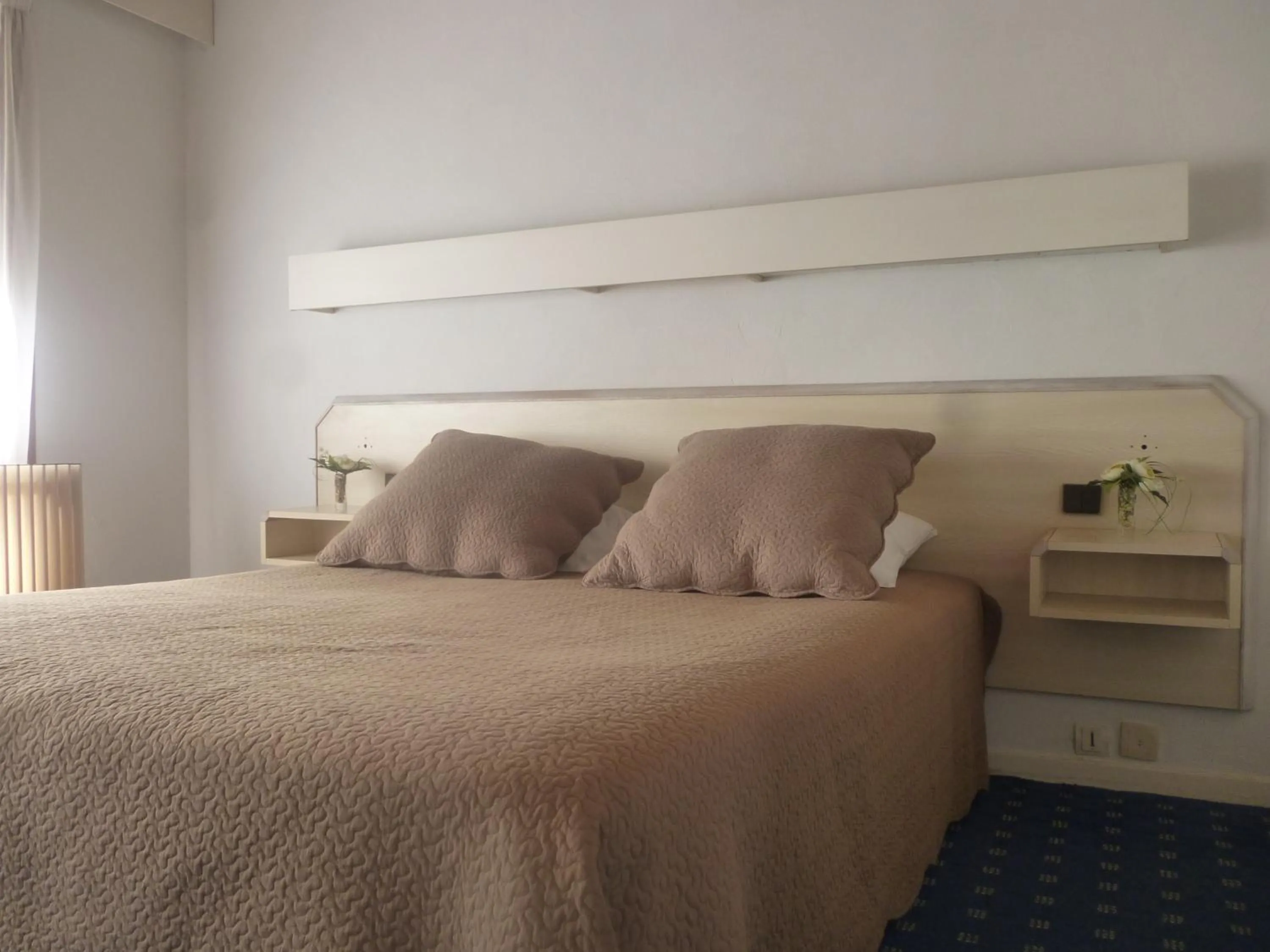 Bed in Hotel Le Mas Fleuri