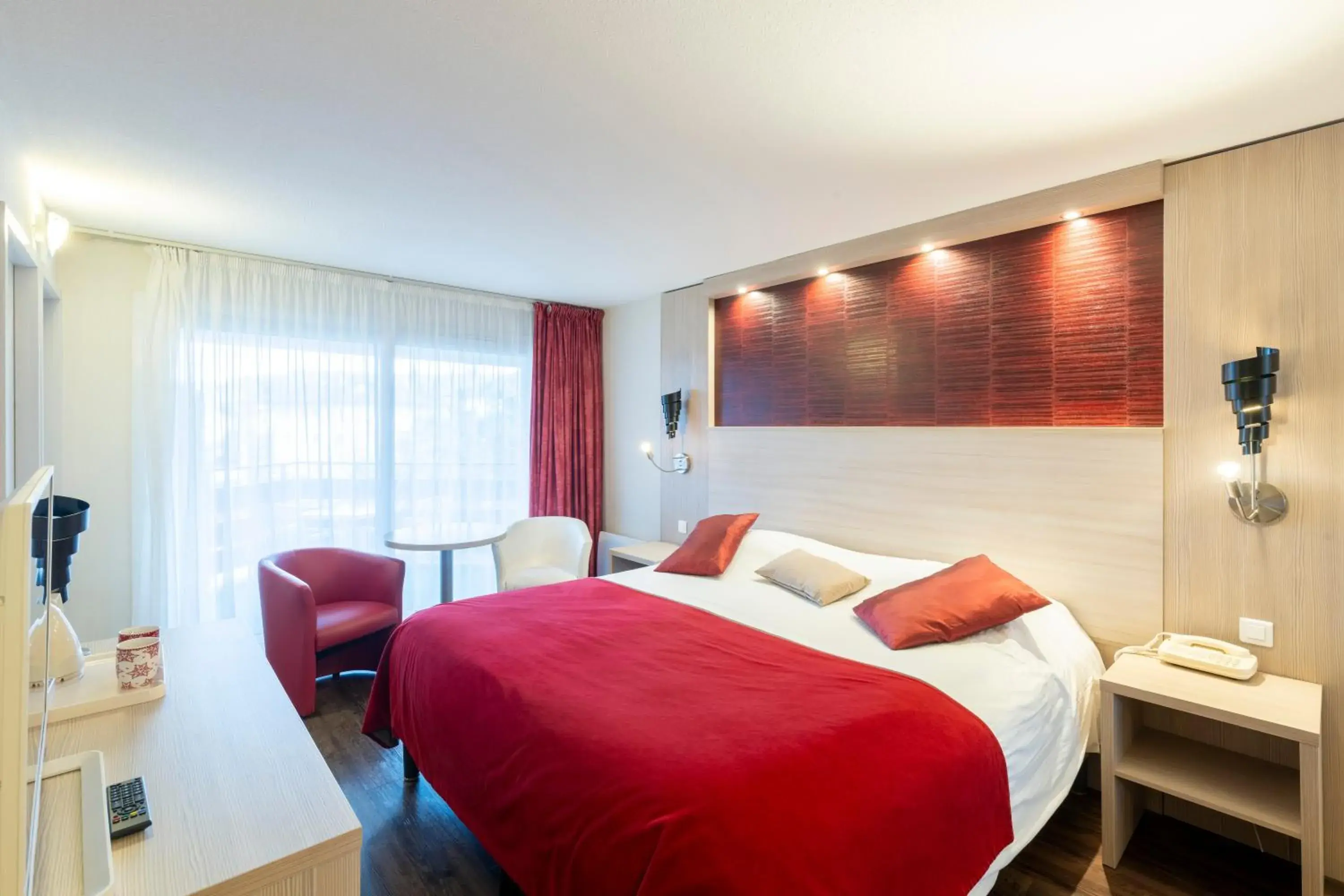 Photo of the whole room, Bed in Logis Hotel Arc En Ciel Photo of the whole room, Bed in Logis Hotel Arc En Ciel