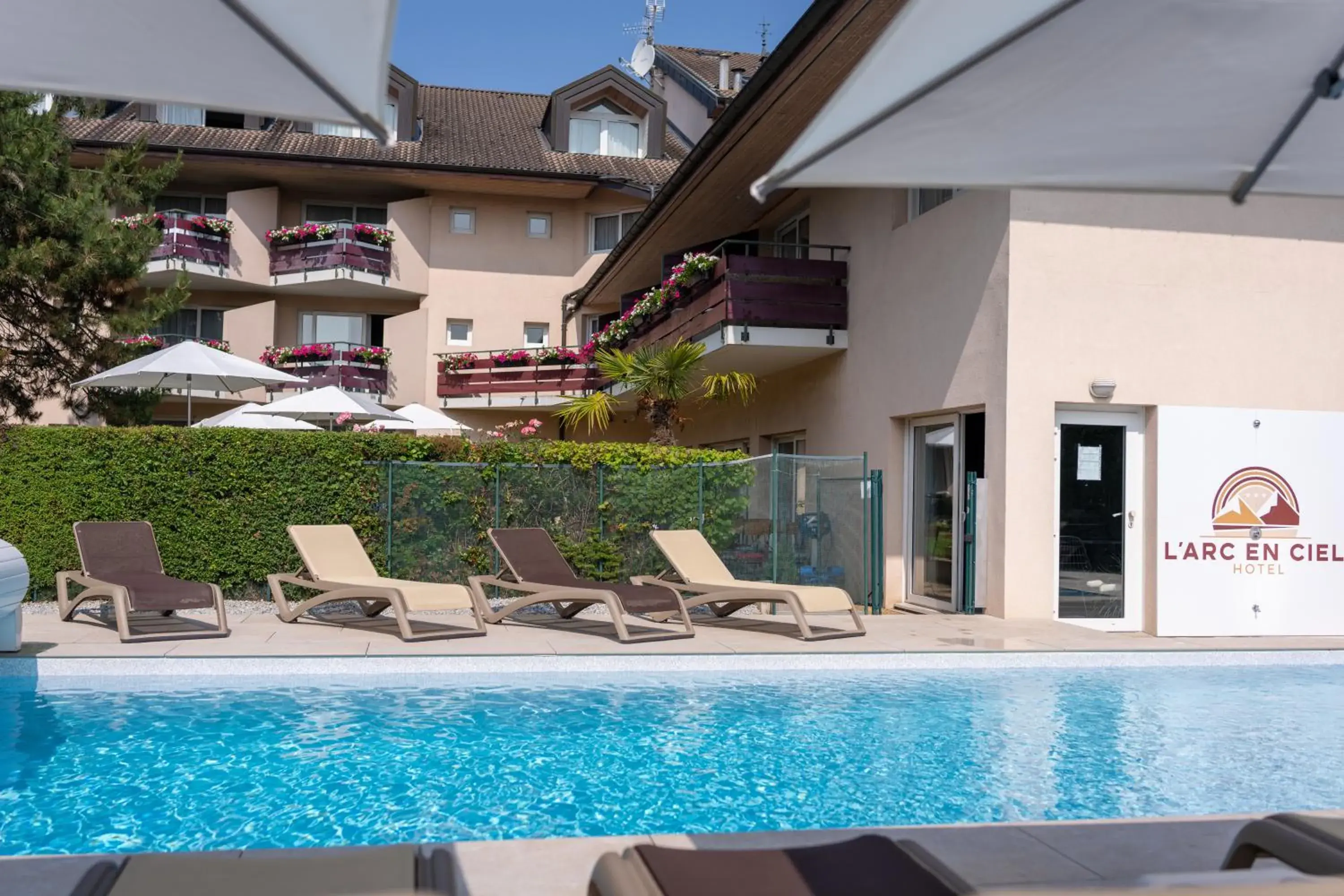 Property building in Logis Hotel Arc En Ciel Property building in Logis Hotel Arc En Ciel