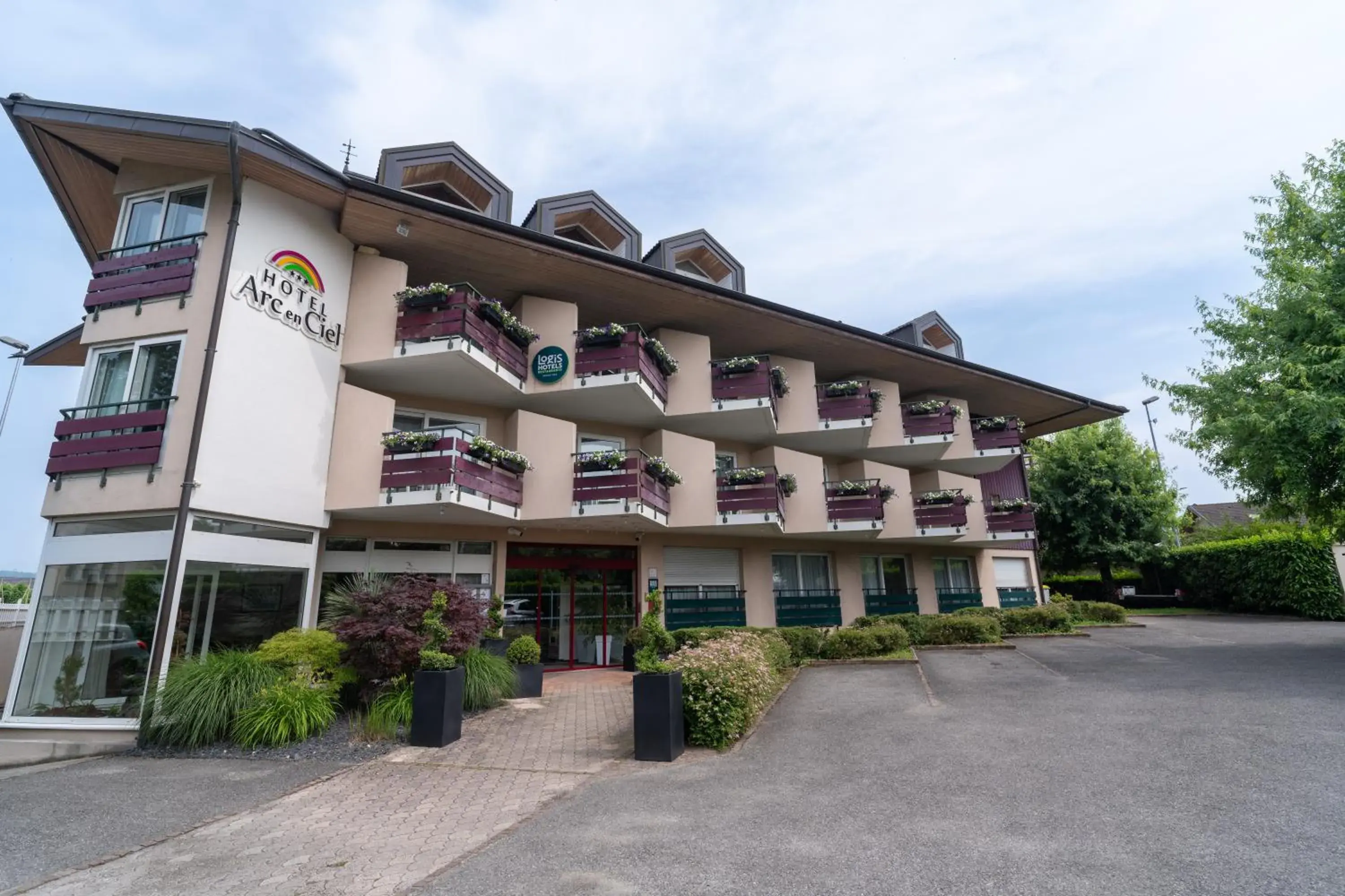 Property building in Logis Hotel Arc En Ciel Property building in Logis Hotel Arc En Ciel