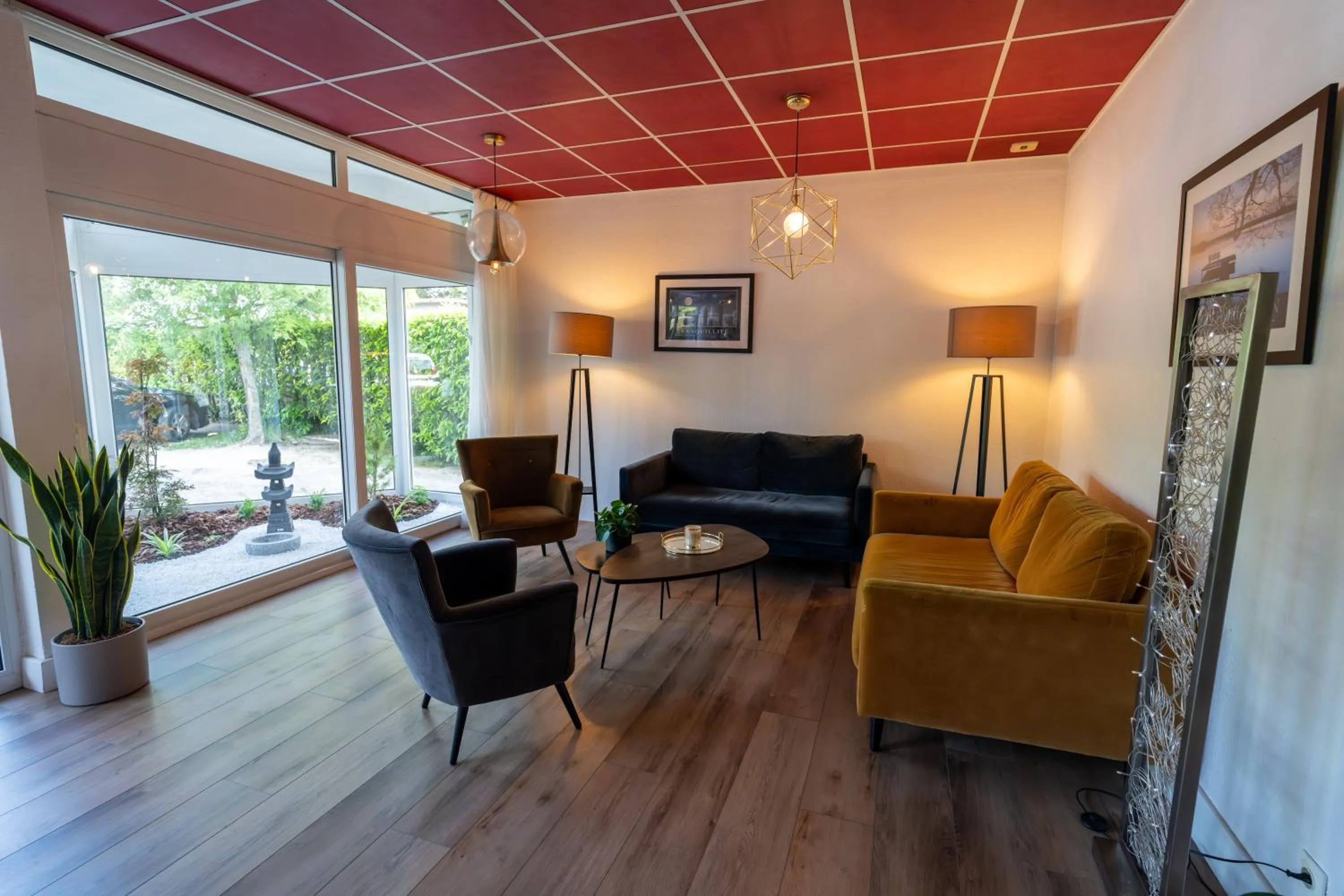 Living room in Logis Hotel Arc En Ciel