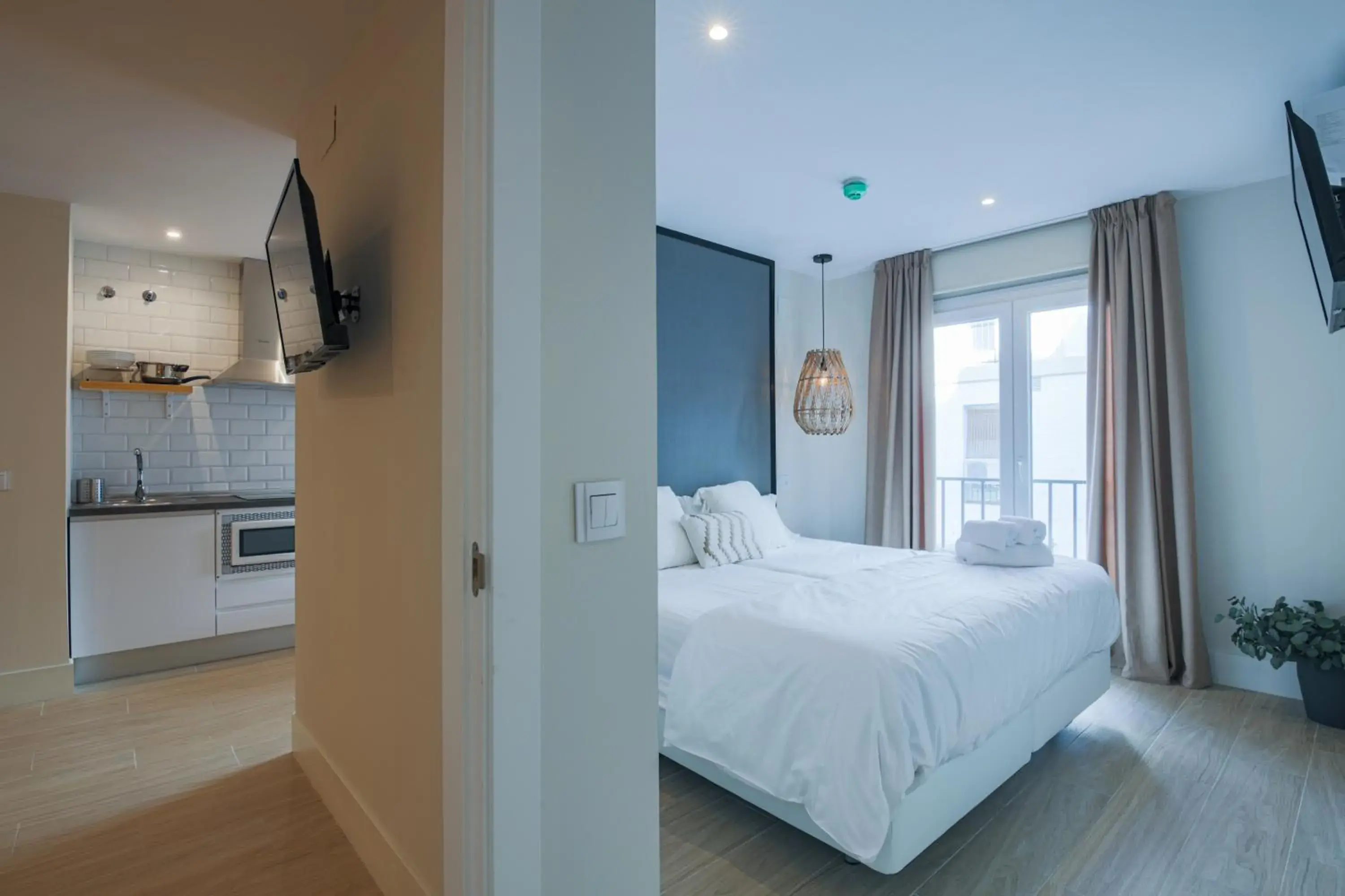 Bedroom, Bed in Apartamentos Magna Sevilla Bedroom, Bed in Apartamentos Magna Sevilla