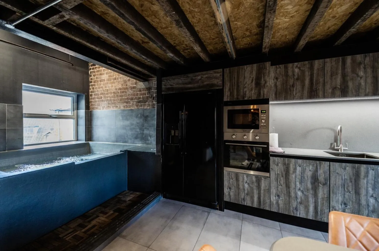 Kitchen or kitchenette in The Loft Sasco Apartments