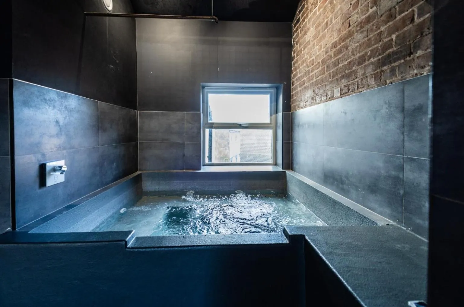 Hot Tub in The Loft Sasco Apartments