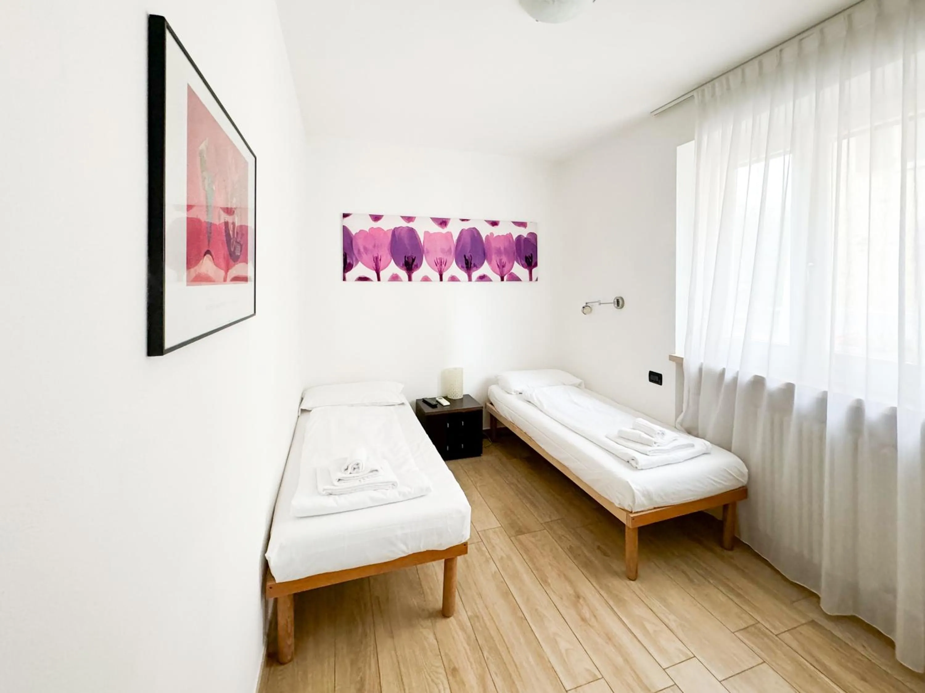 Bed in Apartments Colombara Bardolino