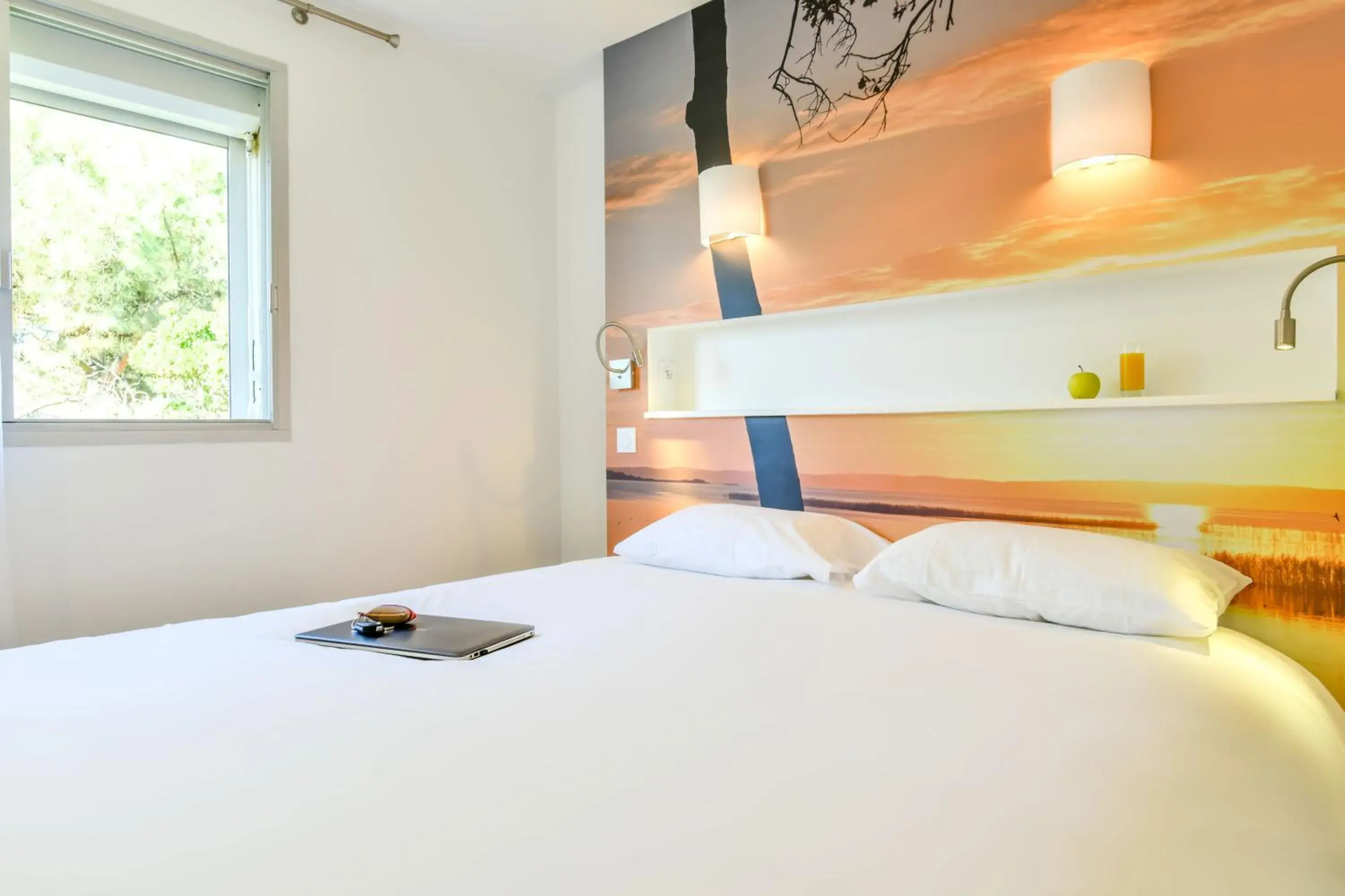 Bedroom, Bed in Les Vagues Hôtel Restaurant Bedroom, Bed in Les Vagues Hôtel Restaurant