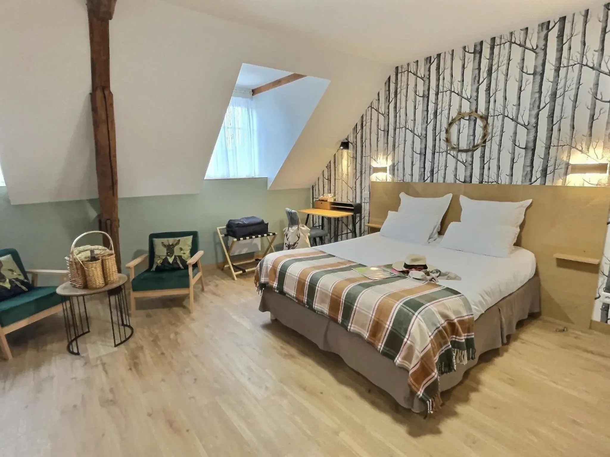 Triple Room on Upper Floor in Logis Hôtel du Cygne Triple Room on Upper Floor in Logis Hôtel du Cygne